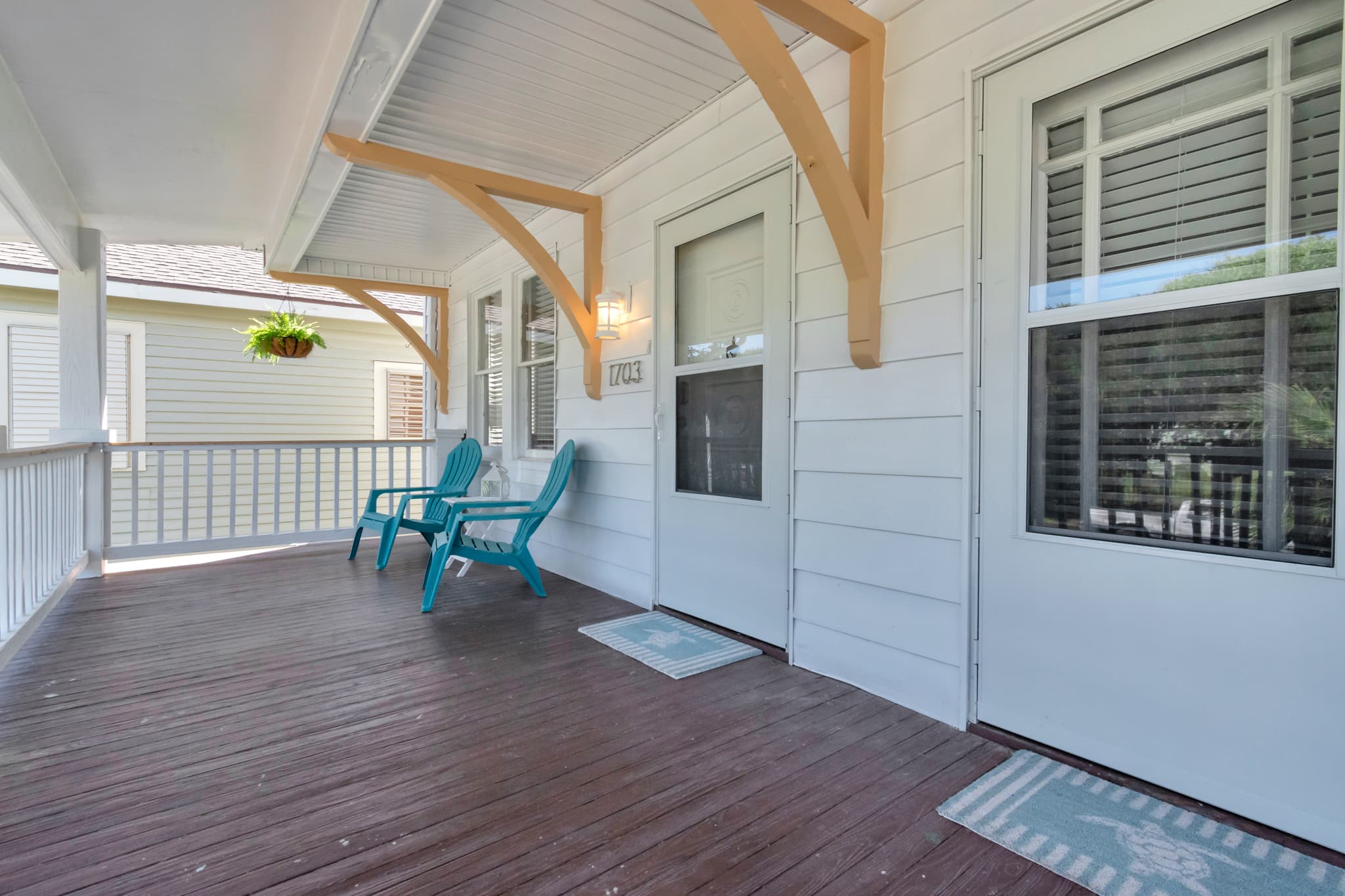 The front entry way to the top left unit, welcomes you for your stay.