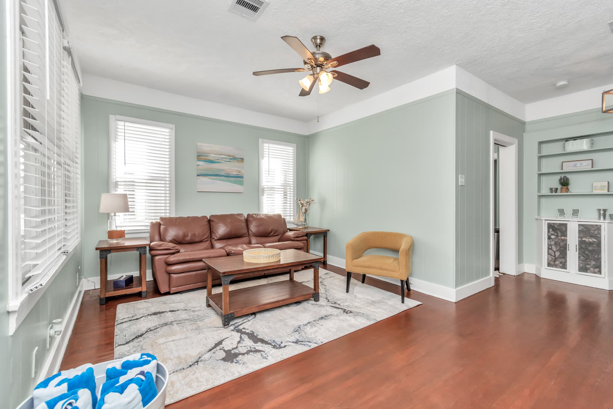 Full living room, tastefully decorated, and available for everyone to gather and watch TV and enjoy each others company.