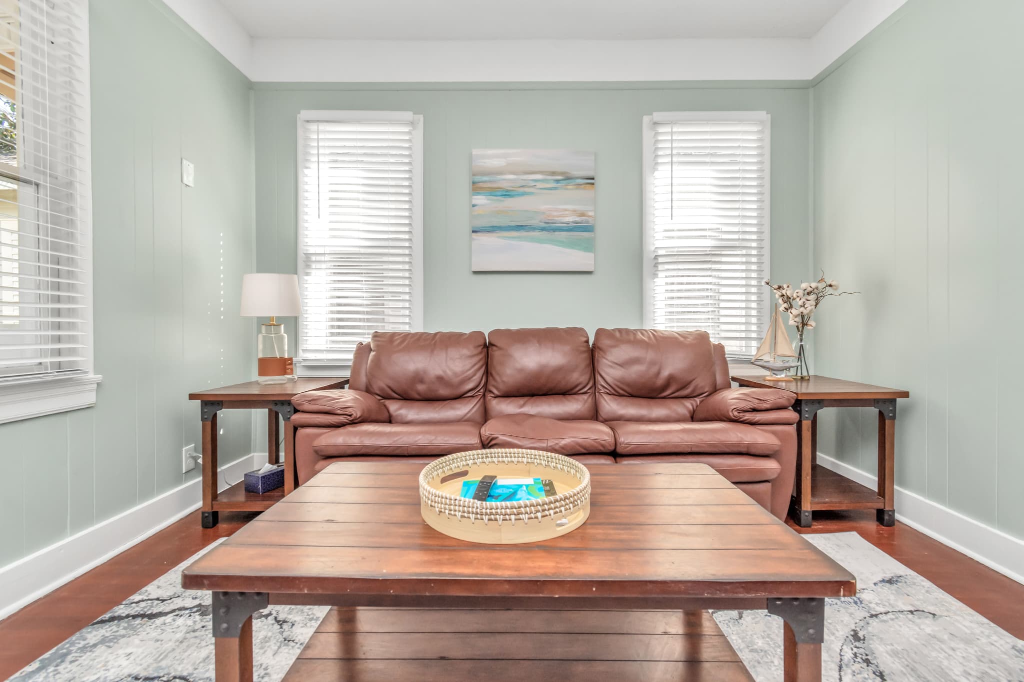 Leather sofa allows you a place to watch the big game, read a book, or just take a nap after a day in the sun.