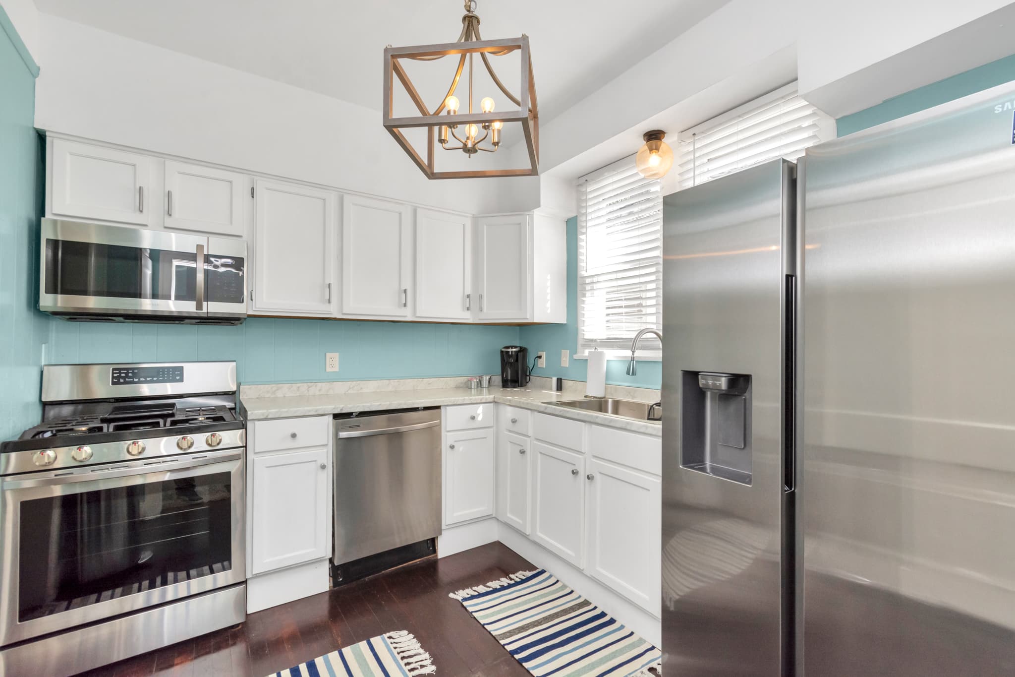Come and enjoy this renovated kitchen with newer appliances to include dishwasher, refrigerator to also include everything such as plates, dishes, pots and pans that you would need.