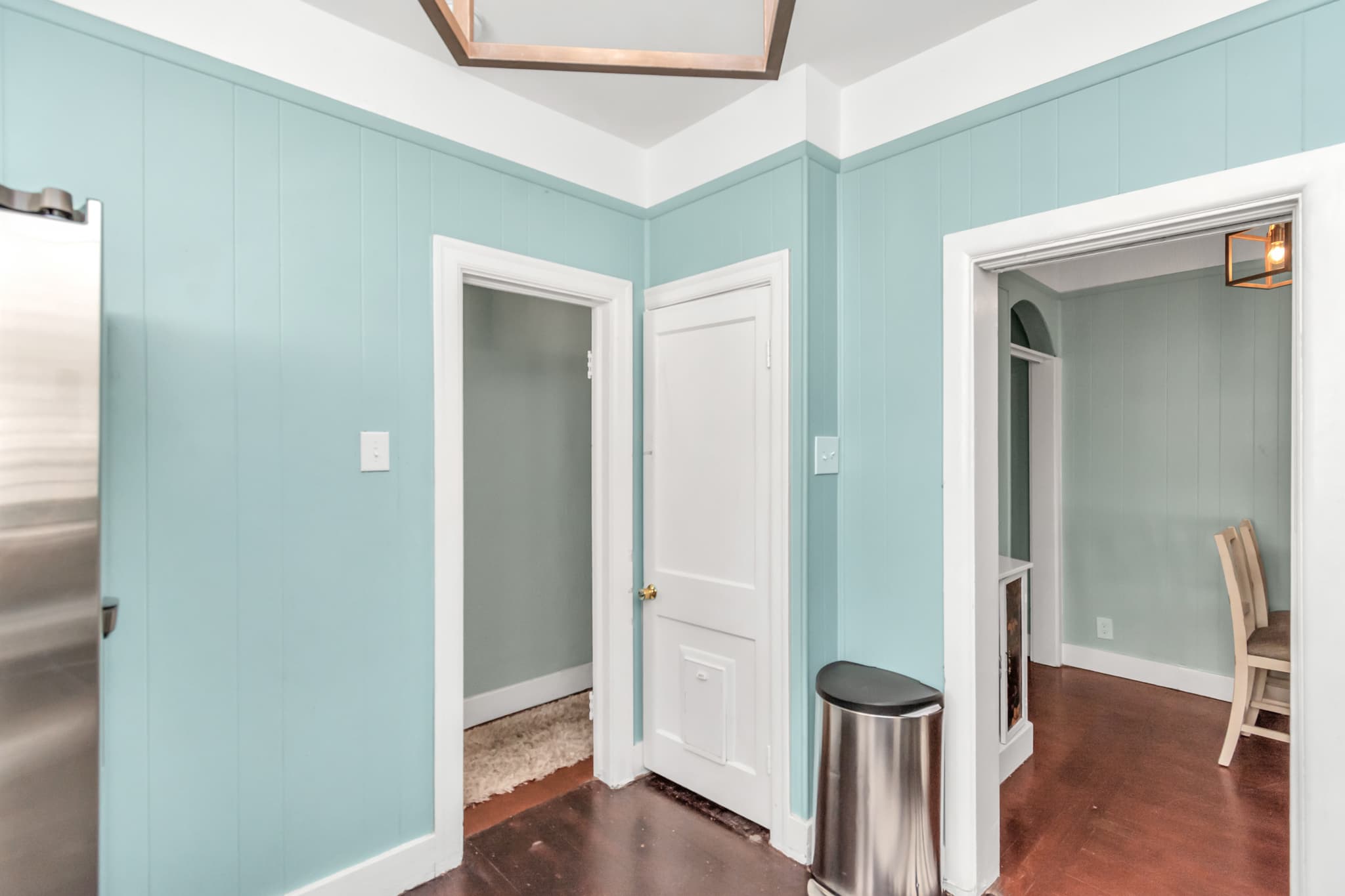 Full kitchen opens up to the full bathroom and hall way as well as the dining and living room area.