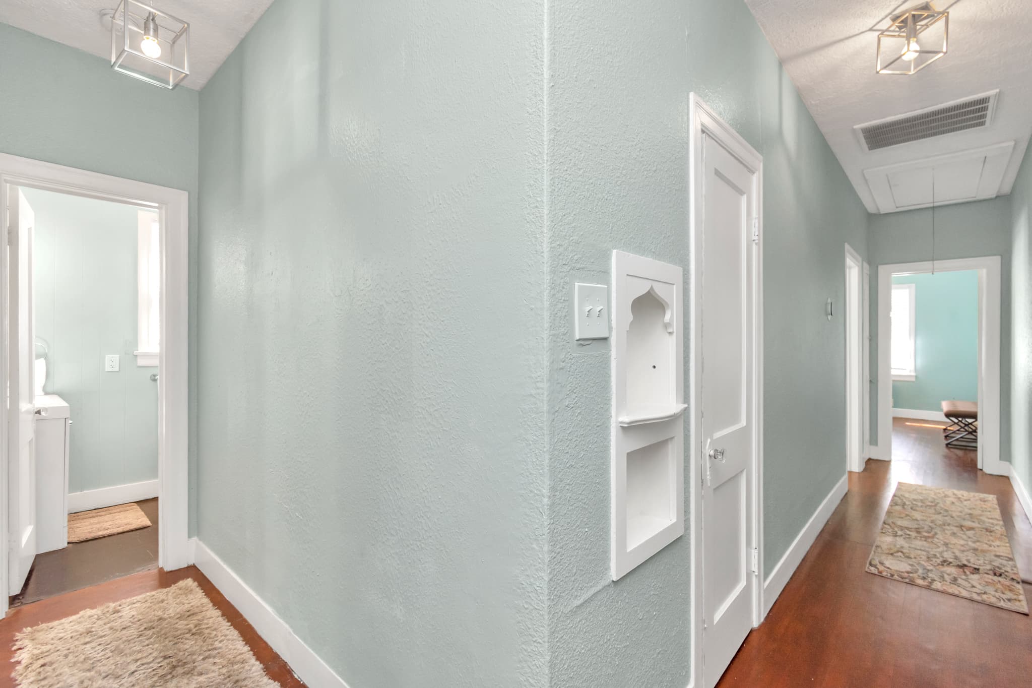 A full bath is located near the kitchen and living room area just a short walk down from both bedrooms.