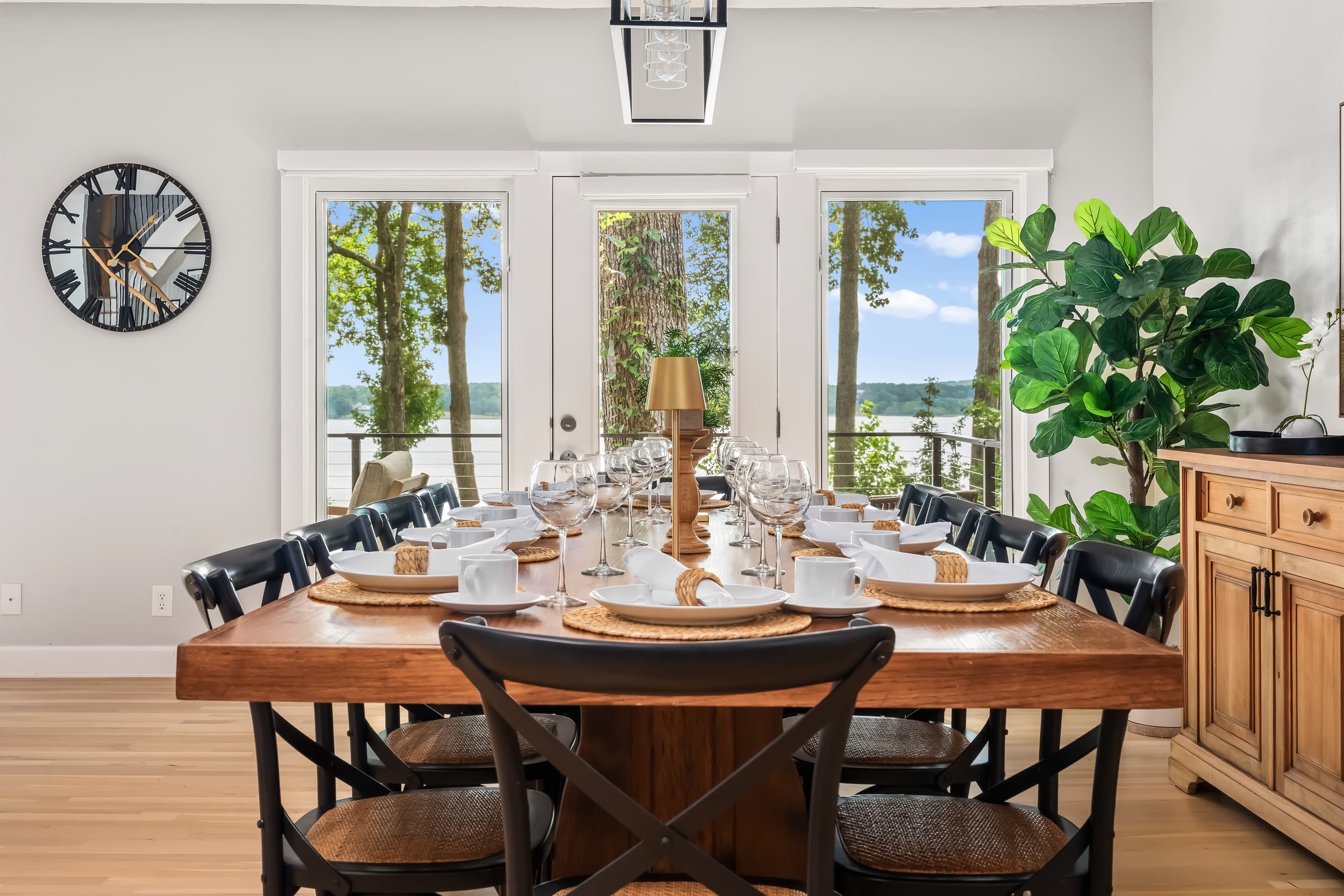 Table with seating for 10, plus adjacent seating for 6 in the kitchen/dining area