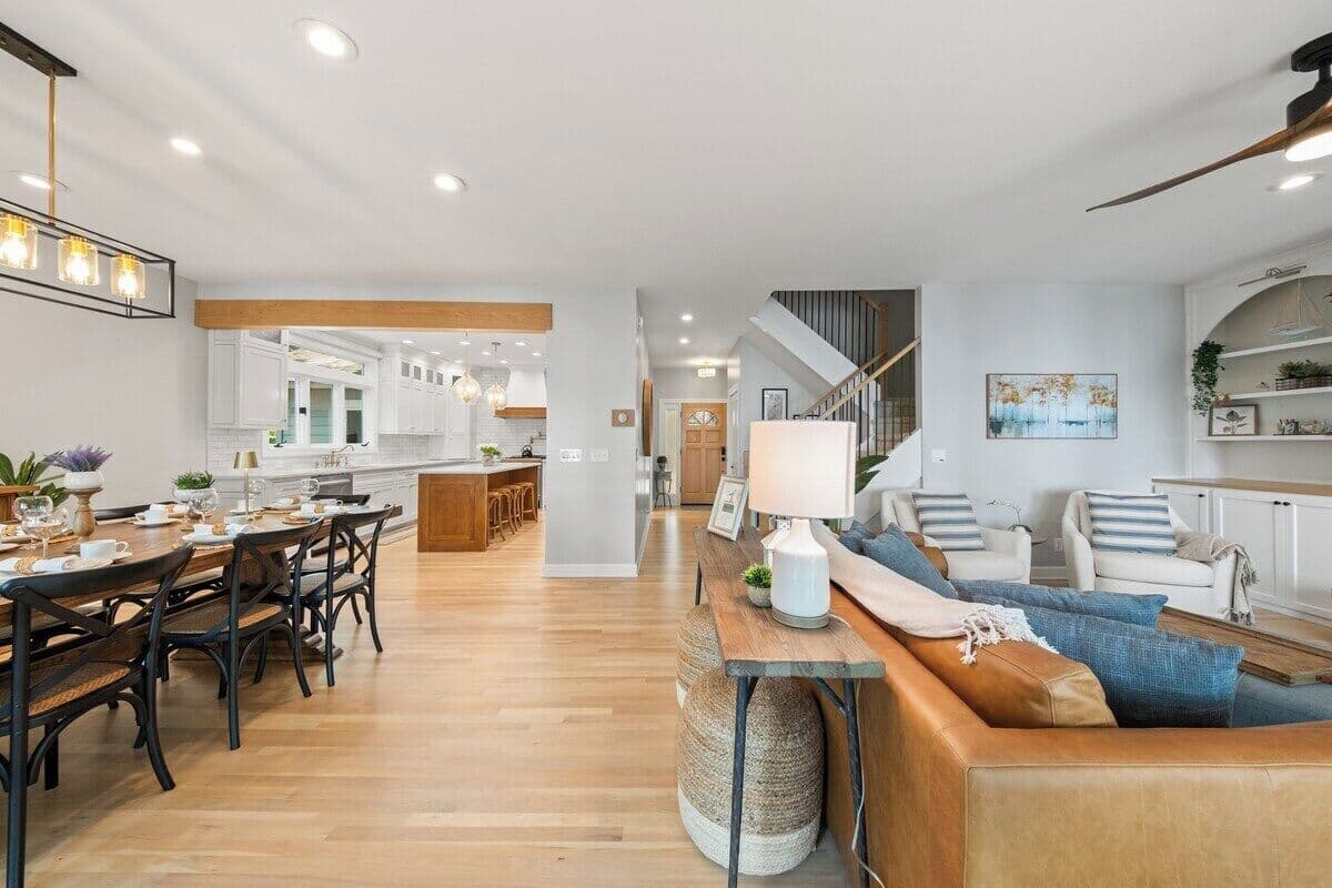 Dining table seating for 10. Adjacent side table seating for 2.  Kitchen counter seating for 4.