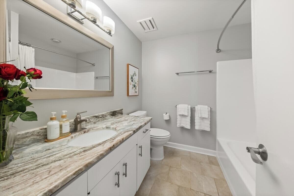 Upstairs Bathroom with combined Tub/Shower