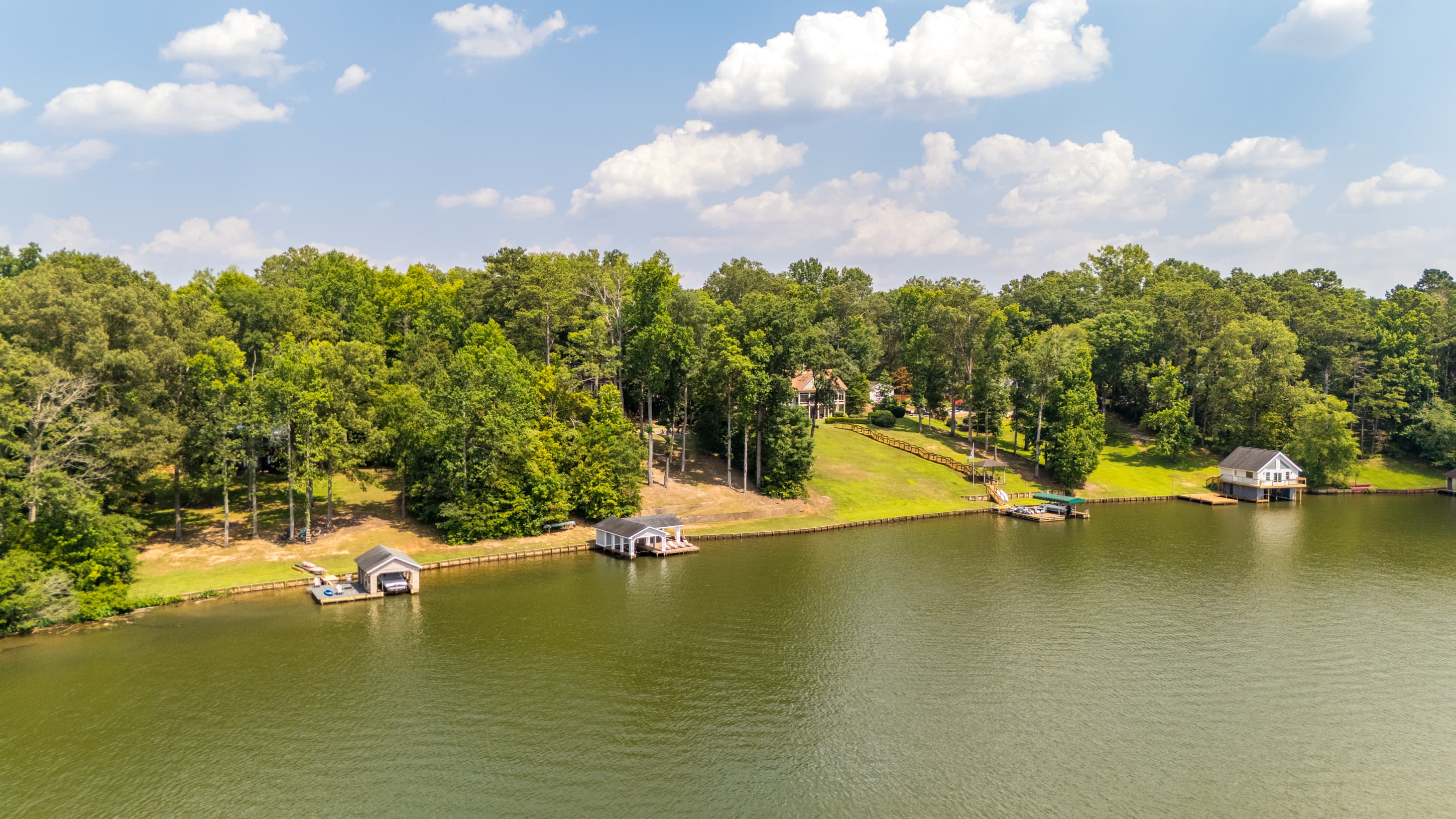 Private dock and private trees surround the property.