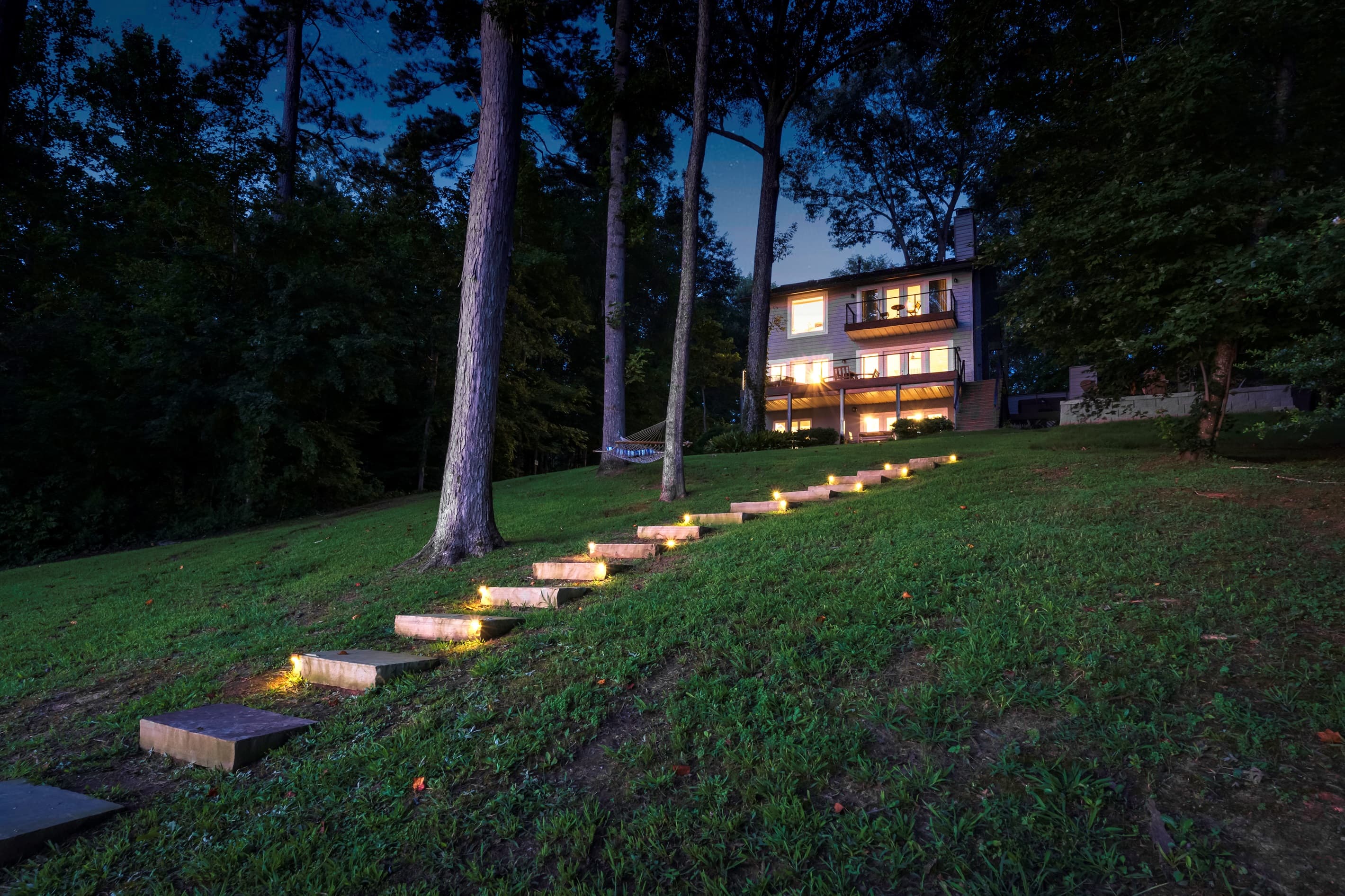 Backyard with steps descending to the lake