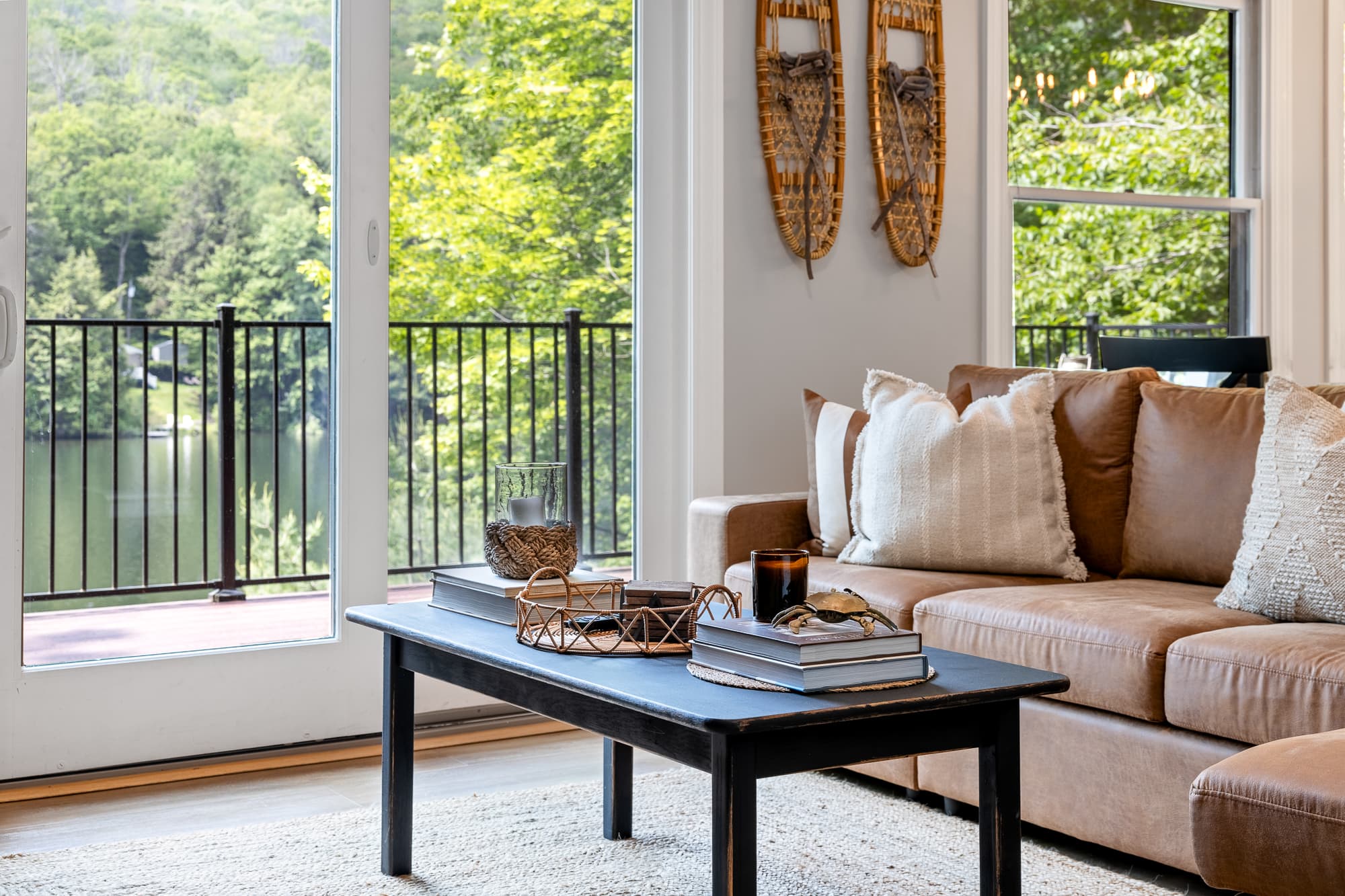 Cozy living room nook w/ soft light & forest views
