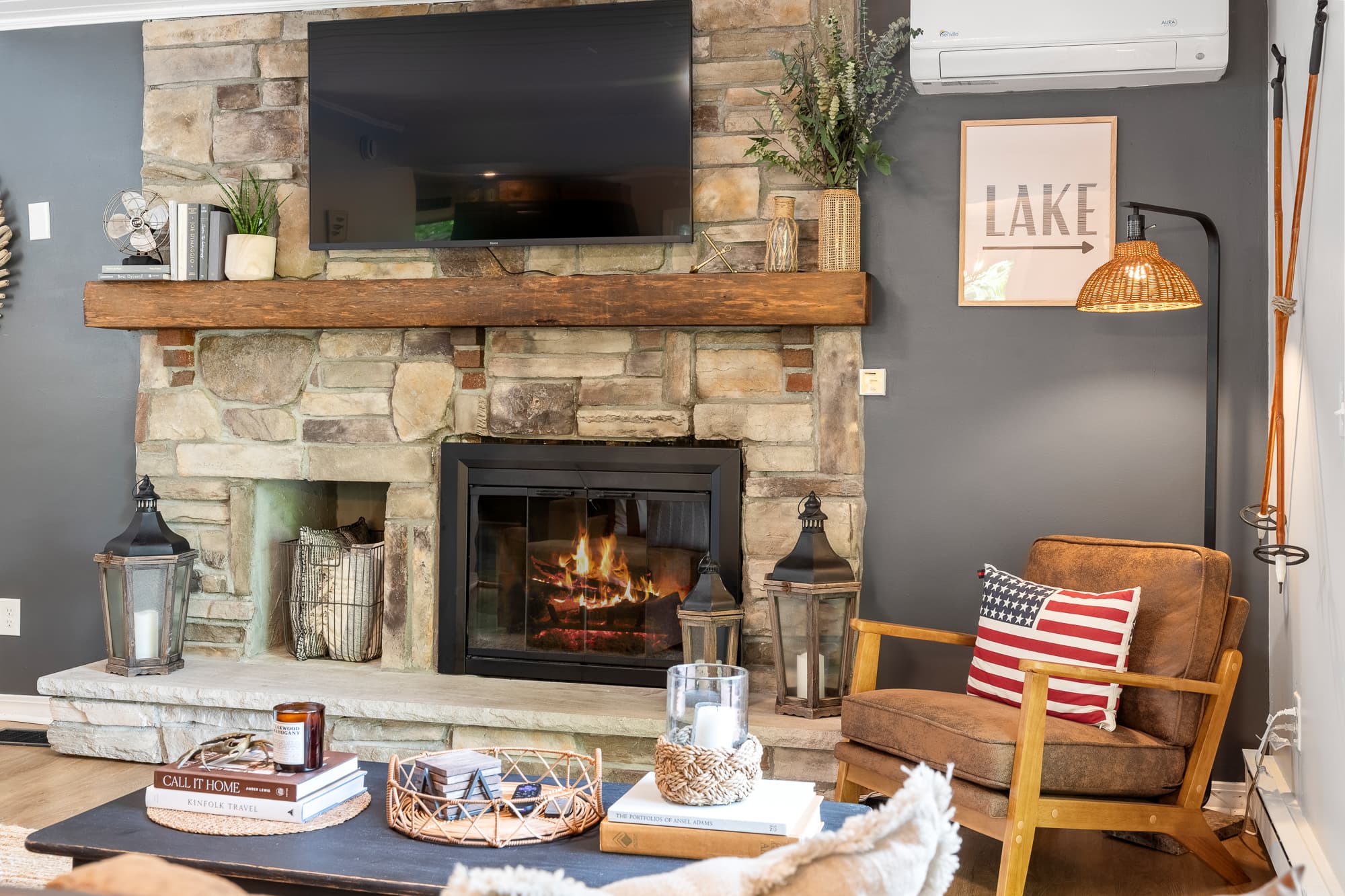Warm living room w/ brick fireplace for cozy nights