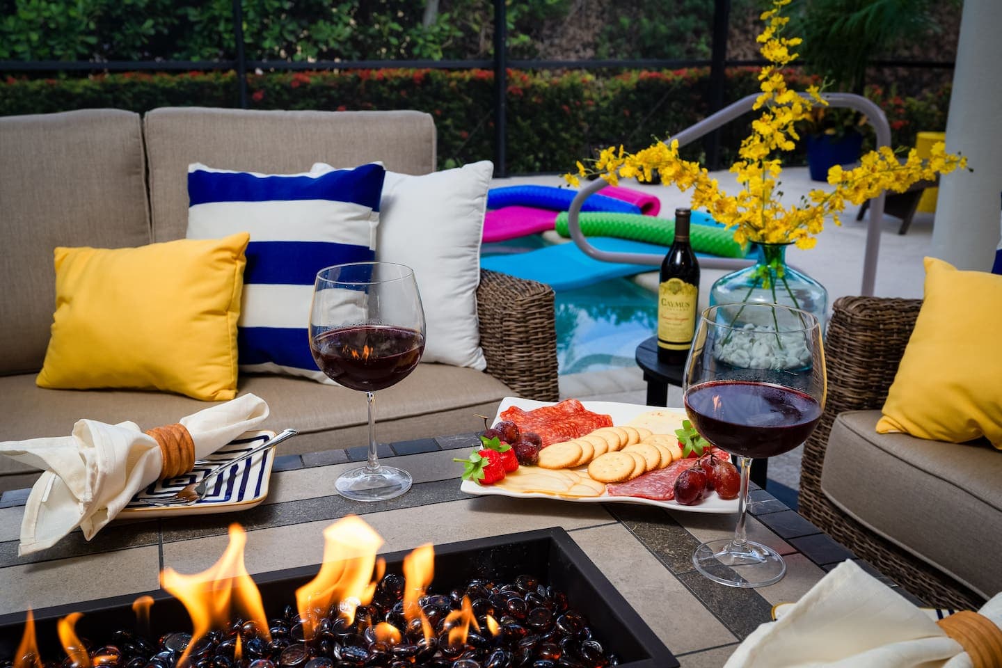 Cozy Evenings by the Firepit: Savor Fine Wine and a Gourmet Charcuterie Plate Under the Stars. Enjoy your private pool oasis.