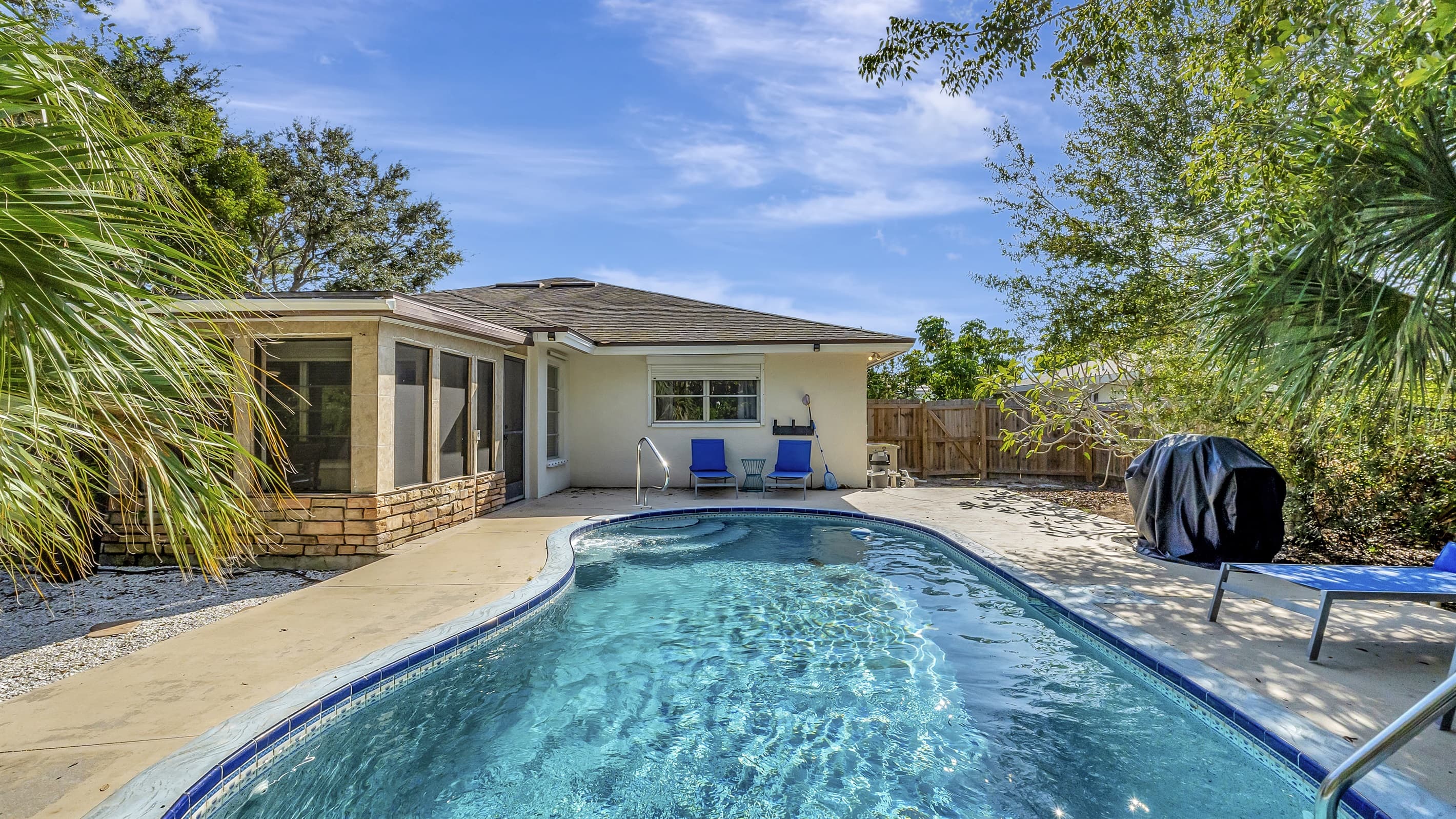 The pool area is just outside the house