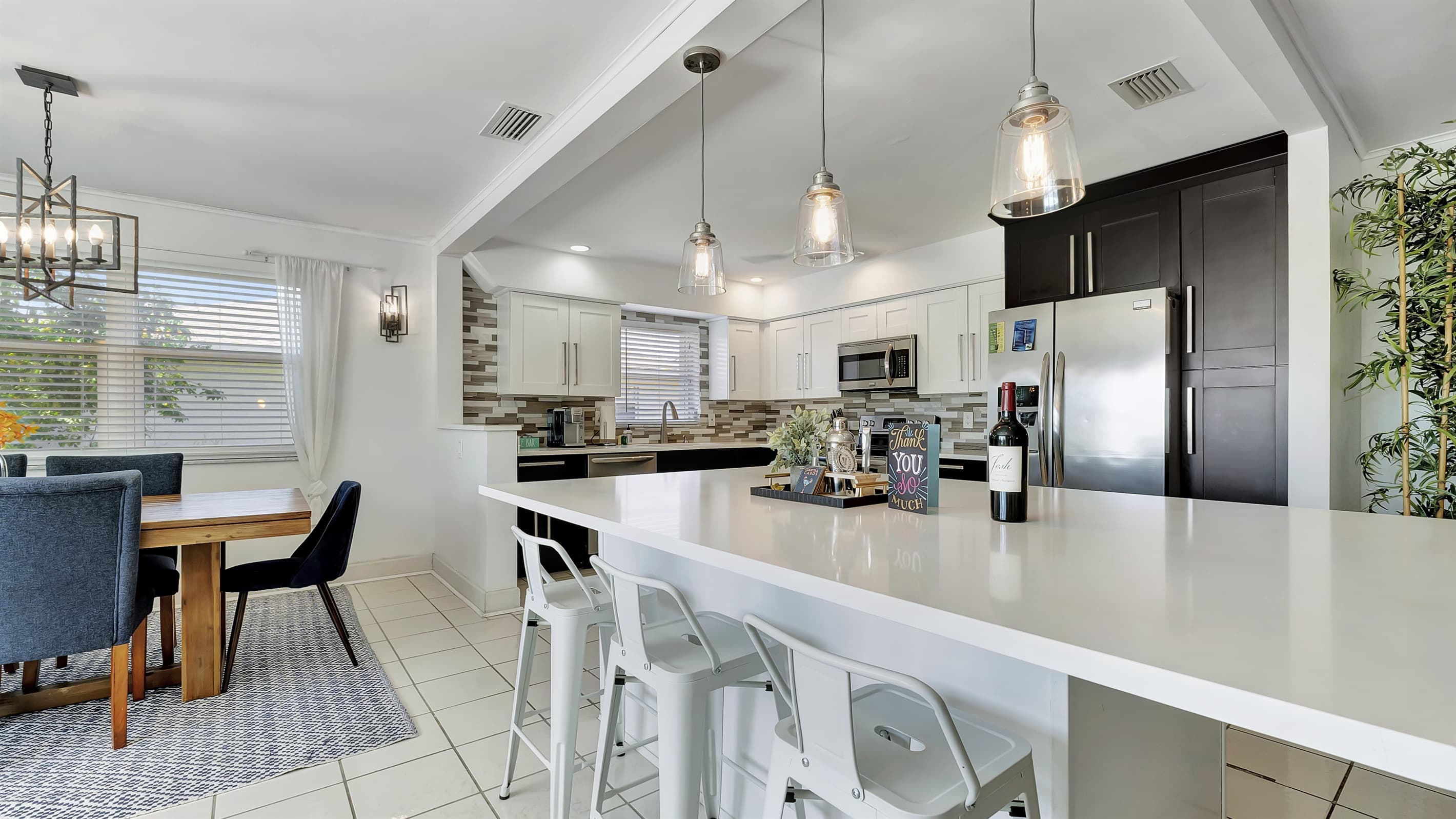 We love the lamps in the kitchen for an extra modern touch