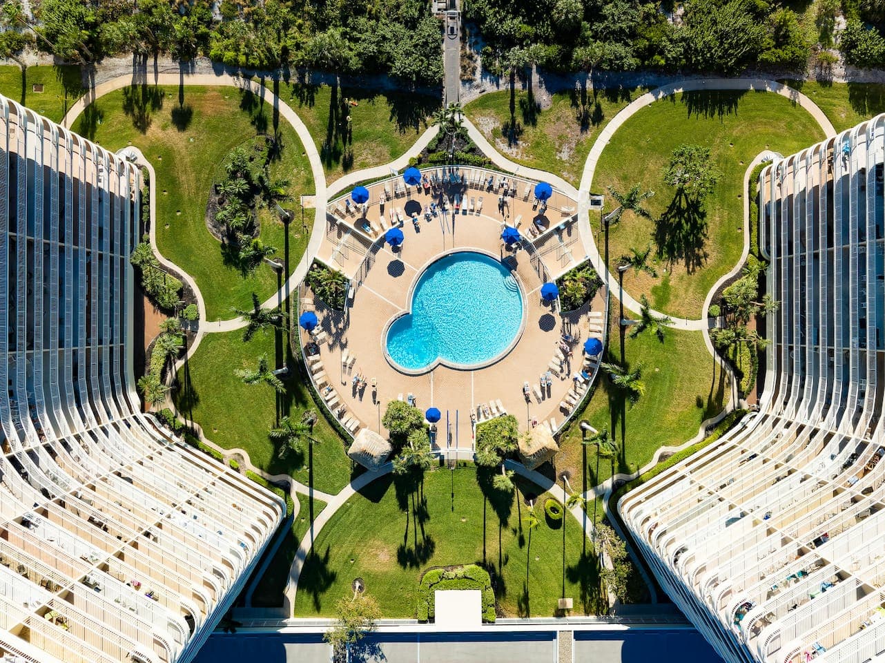 Aerial Elegance: Majestic Airbnb Property with Serene Pool, Captured from Above