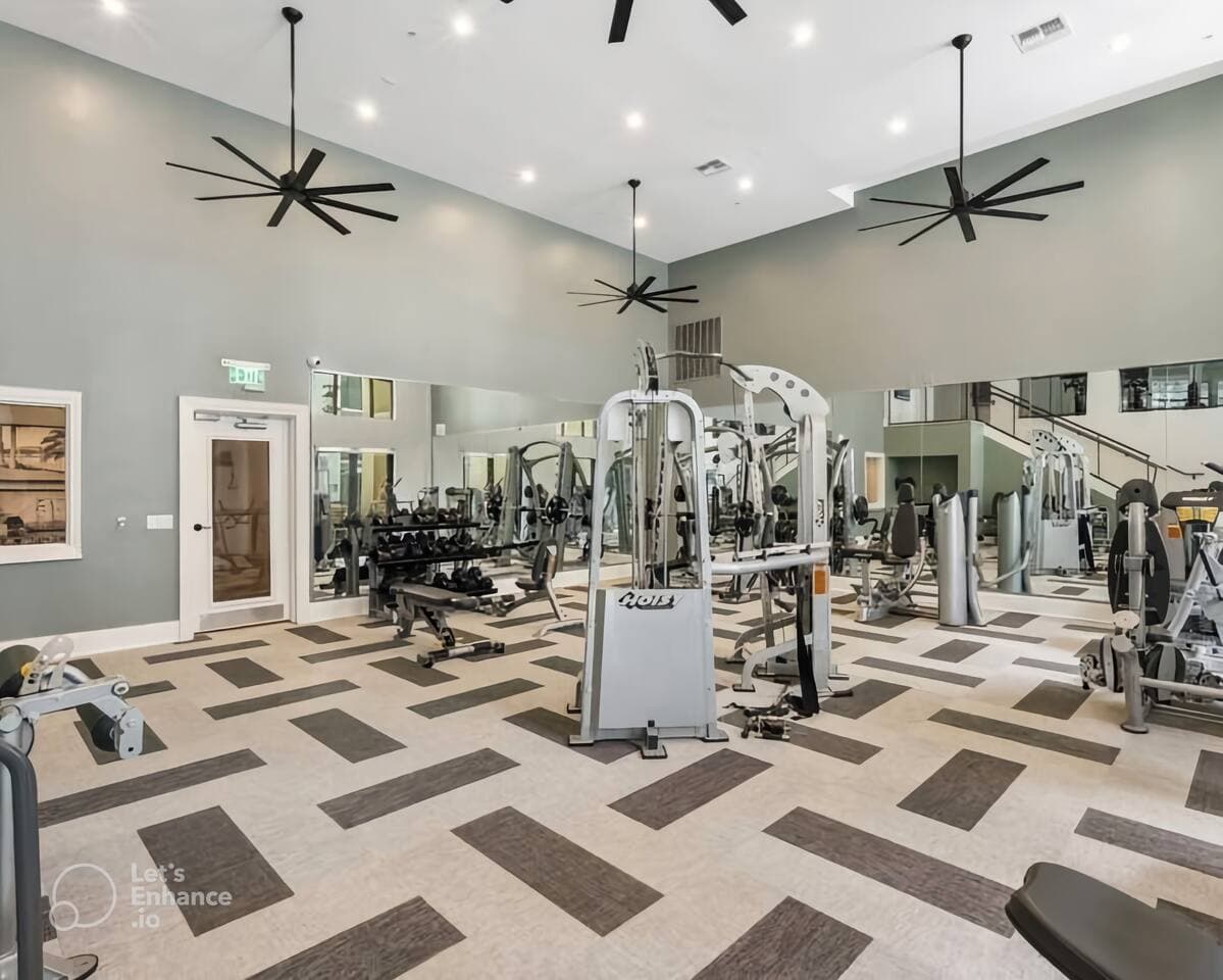 The first floor of the gym includes free weights, kettlebells, and a variety of machines for your training needs.
