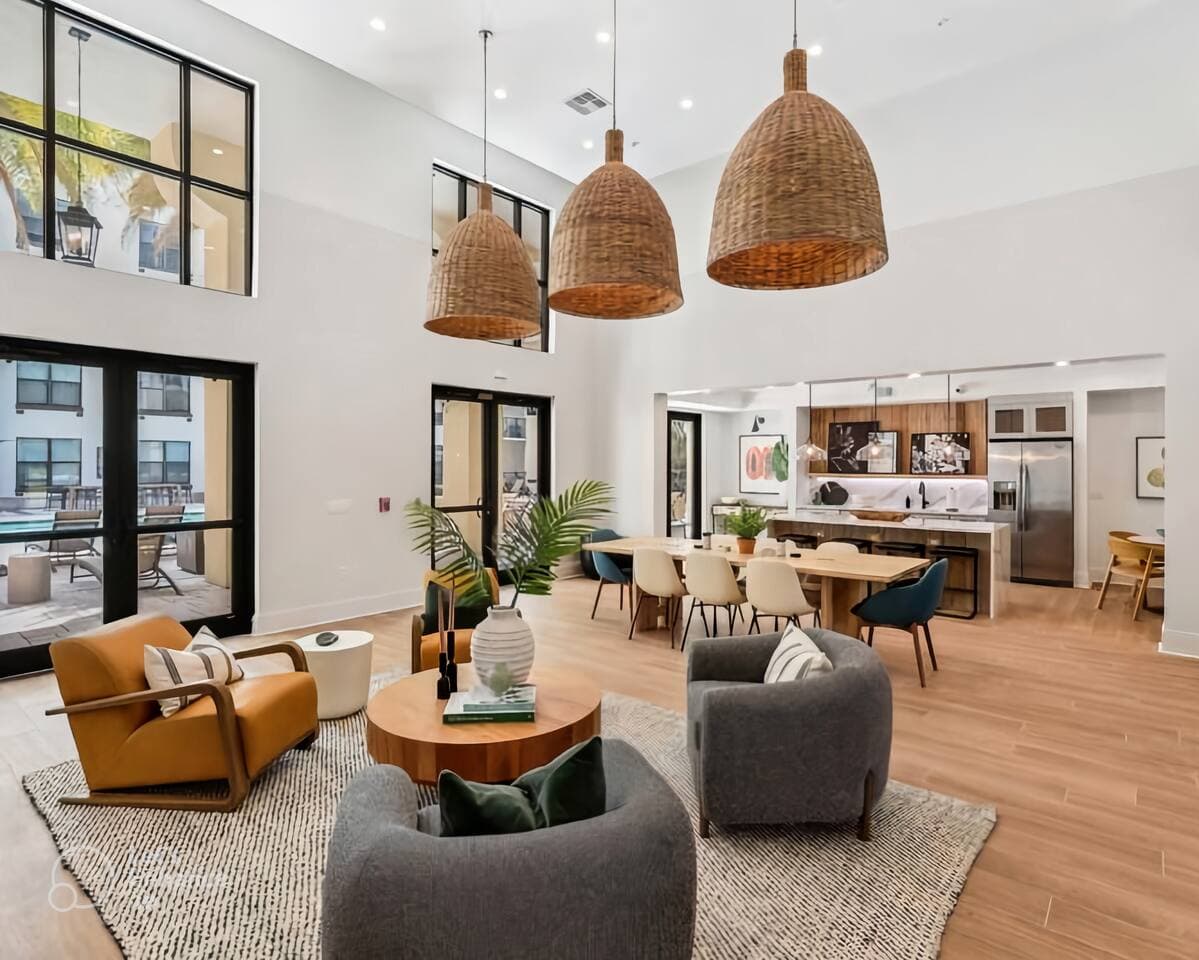 The recently renovated community lounge sits right off the pool.