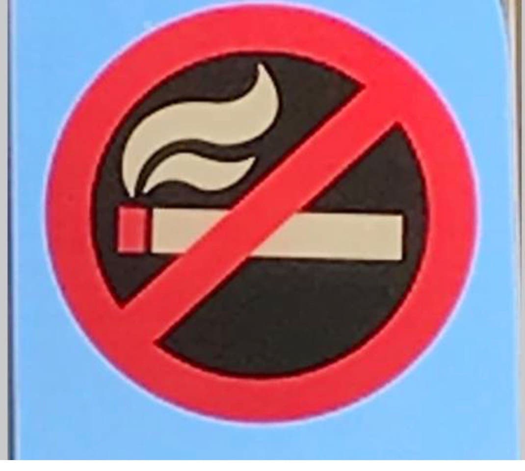 No smoking indoors, including bathrooms, please pick up your butts if you smoke outside