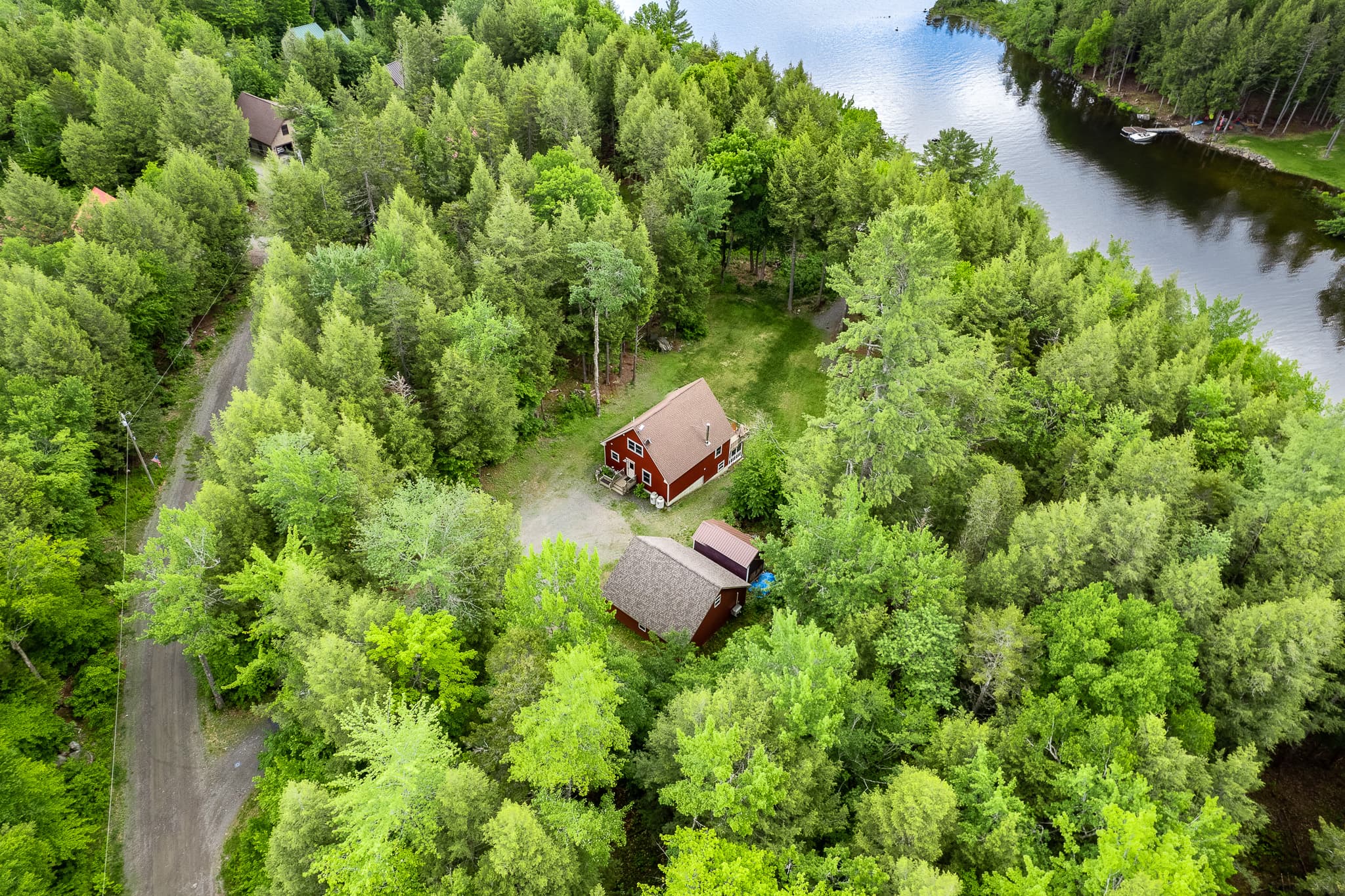 Aerial view of the house and large parking area for truck and trailers. Peaceful and quiet surroundings that are perfect to unplug and relax.