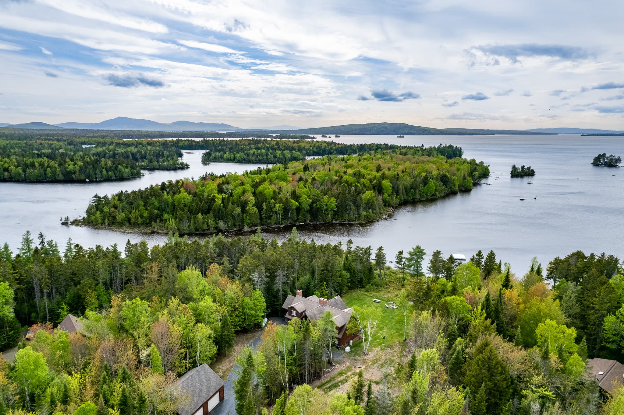 Lily bay on Moosehead Lake-the biggest lake in Maine. Beautiful sunsets, mountain backdrop, and your own relaxing waterfront in the best location in ME. US News & World Report voted Moosehead as one of the country's best lake vacations.