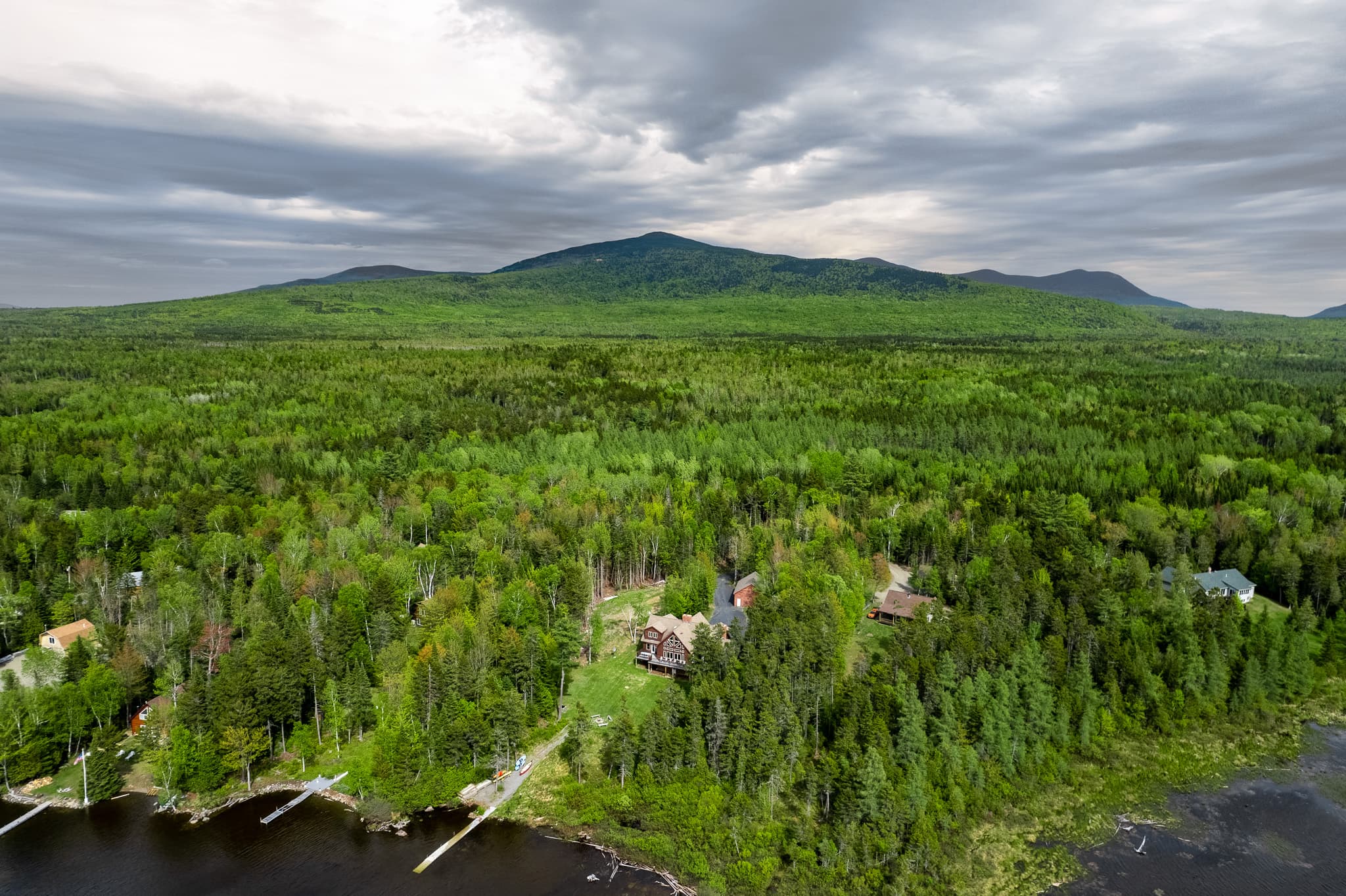 Lakefront with mountain backdrop. The best of Maine! Perfect location with restaurants, shops in Greenville as well as outdoor activities all on the same road like Lily Bay Stare Park that occupies 924 acres on the southeast shore of Moosehead Lake.