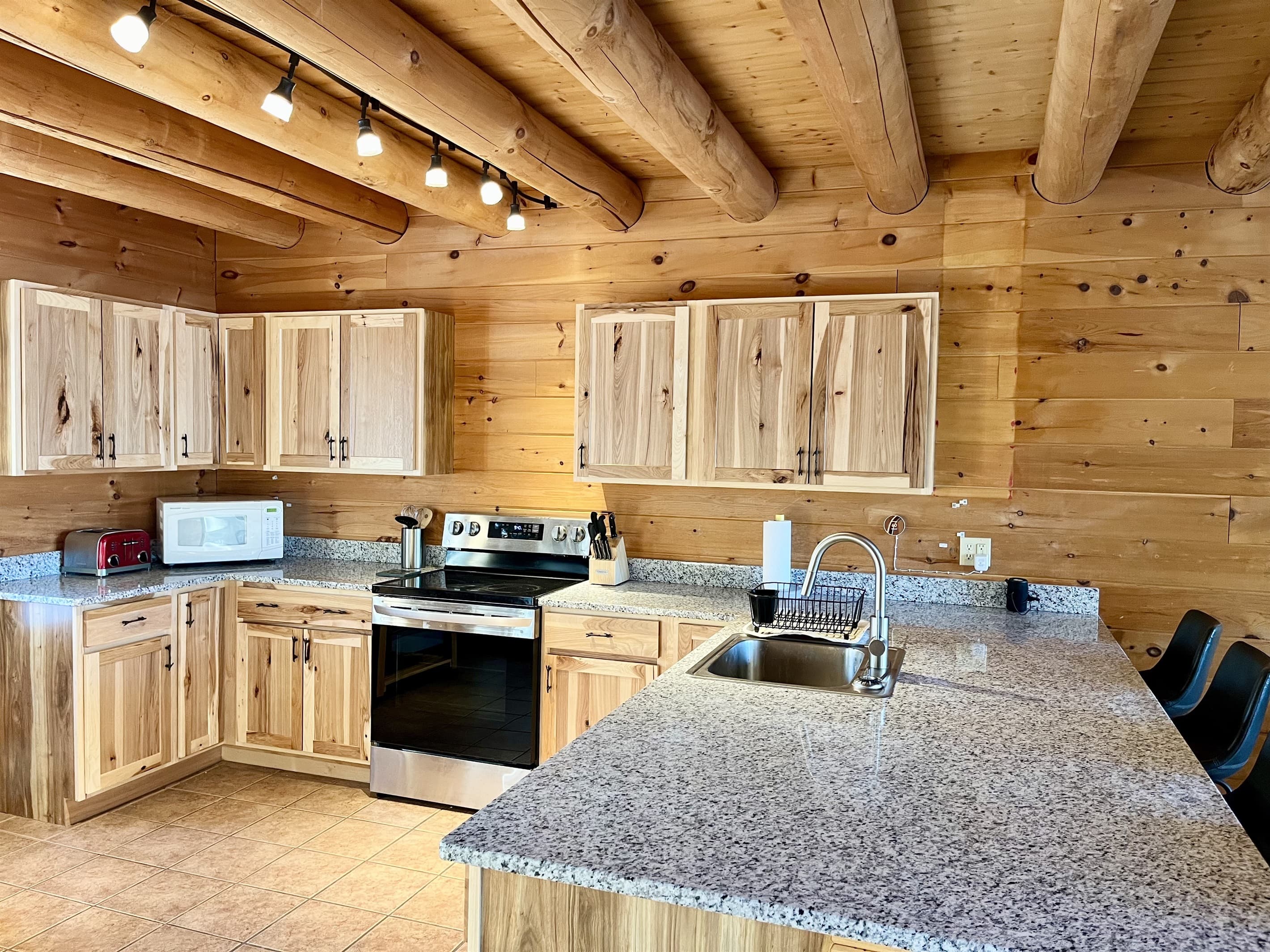 A fully stocked kitchen with all the appliances, cookware, and gadgets you'll need to enjoy family meals, and enjoy coffee breaks.