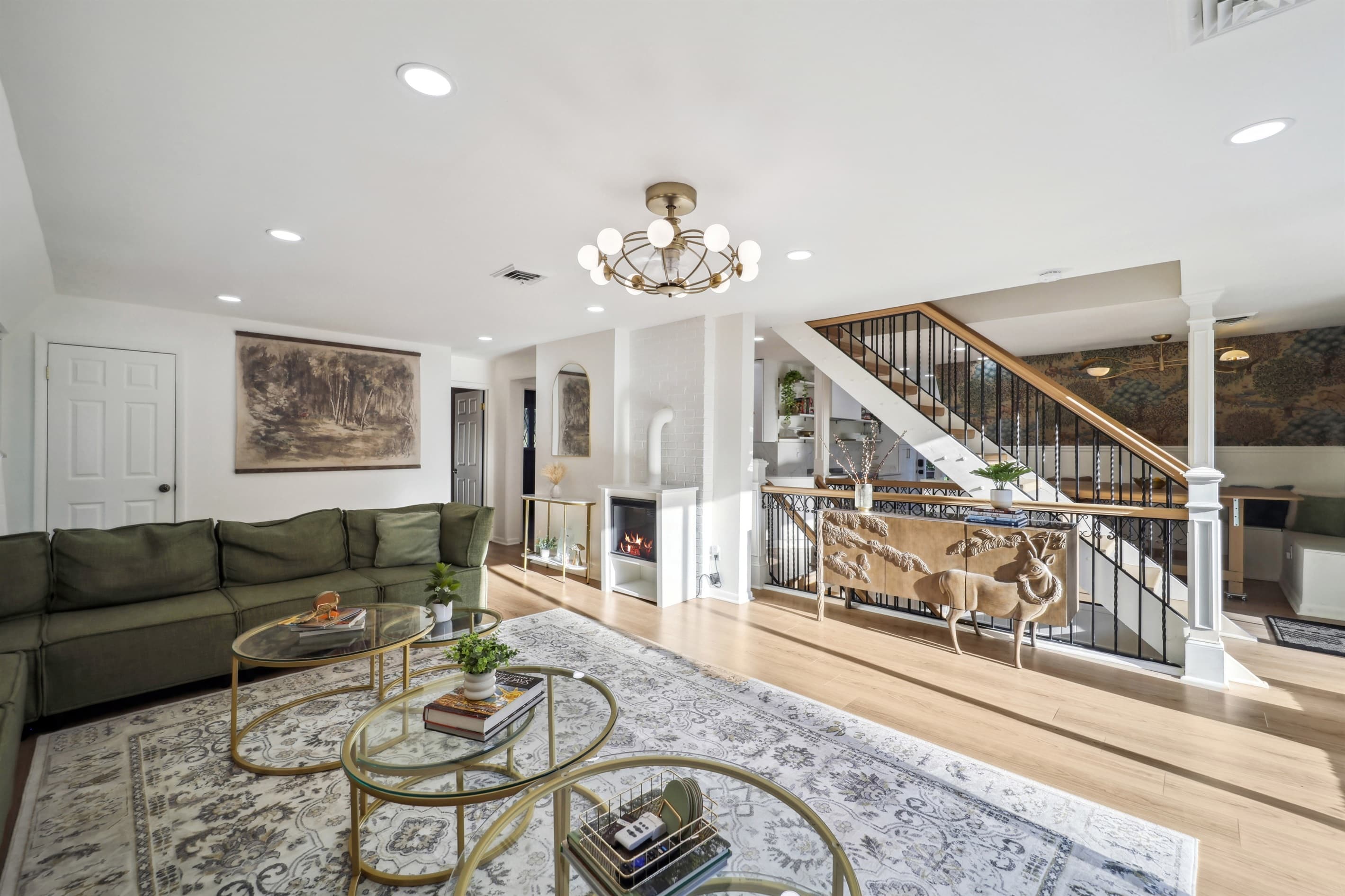 Enjoy the nature inspired decor and furniture pieces that add charm to the house. Enjoy the glow from the modern electric fireplace while you cuddle with a book in the evenings.