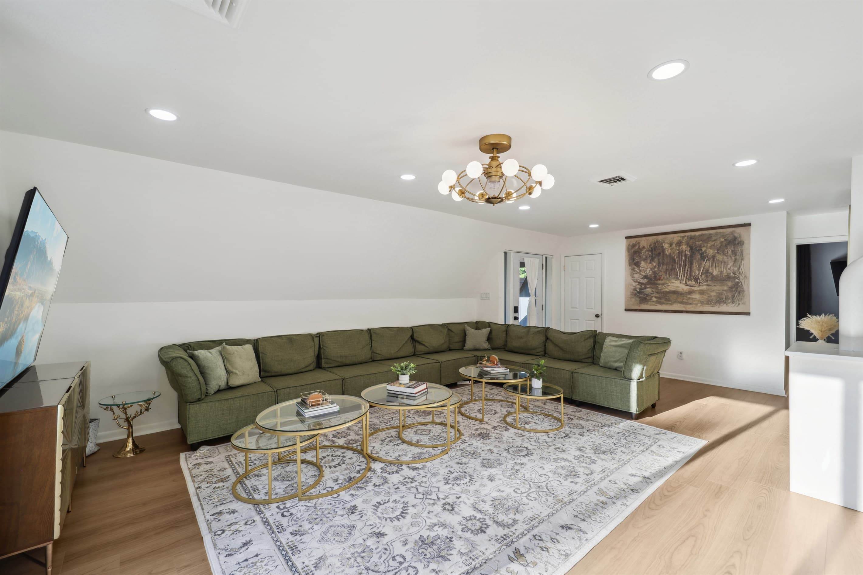 This large living room can sit up to 10 people at a time. It’s a great space to hang out and make memories with loved ones.
