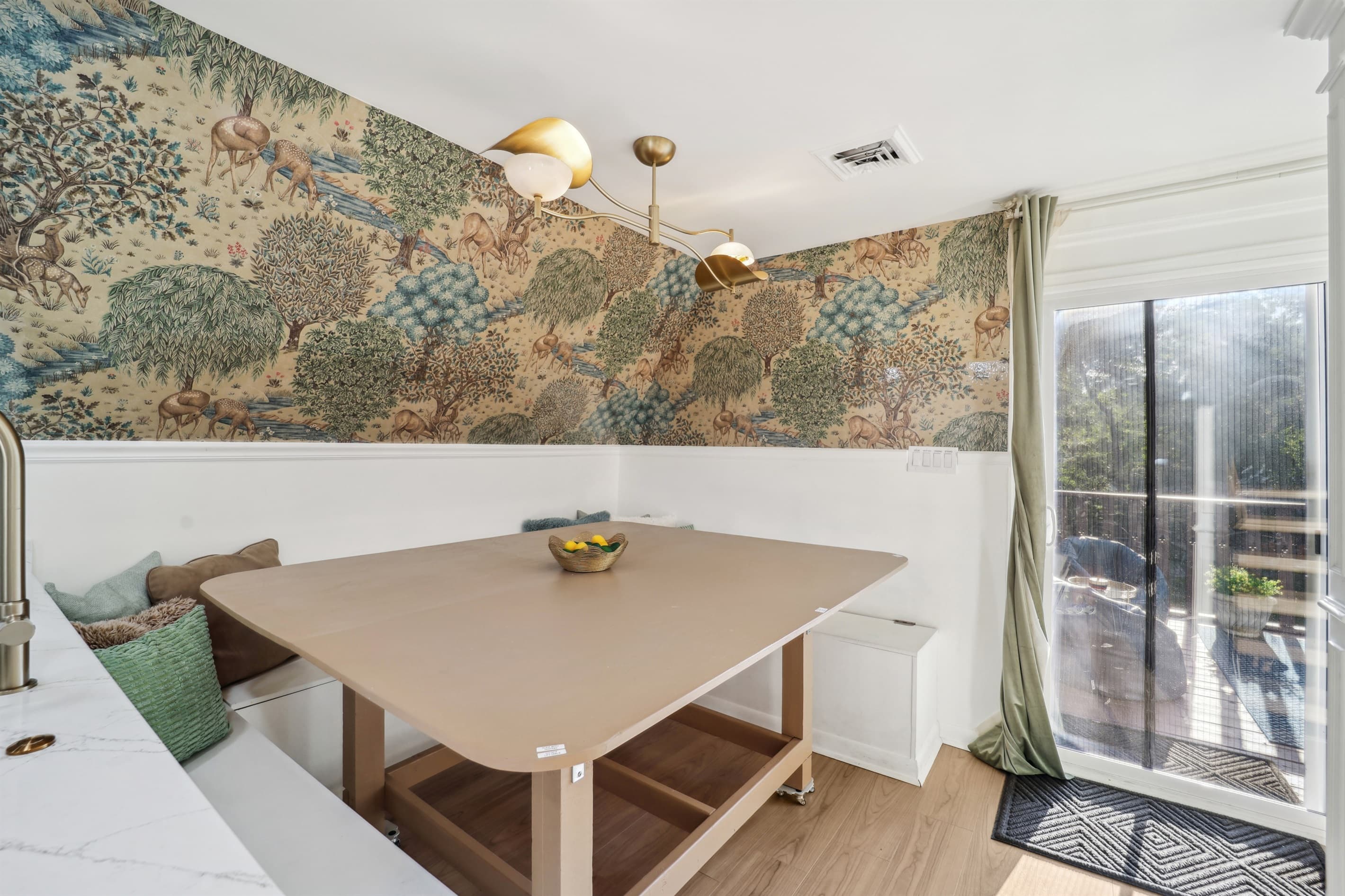 The dining nook can fit 9-12 people
