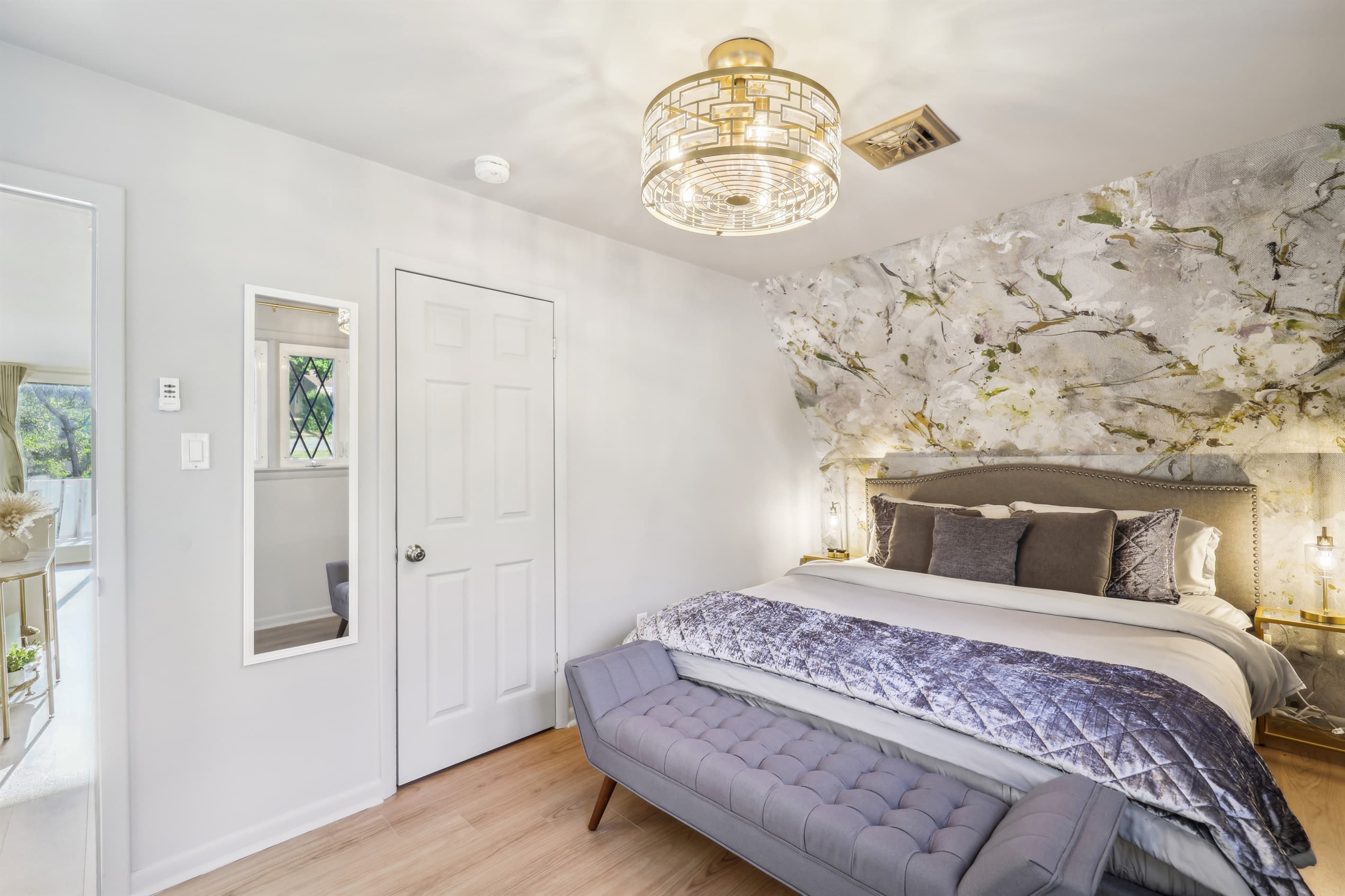 Each bedroom's closet has a luggage rack and hanging shelfs for storage