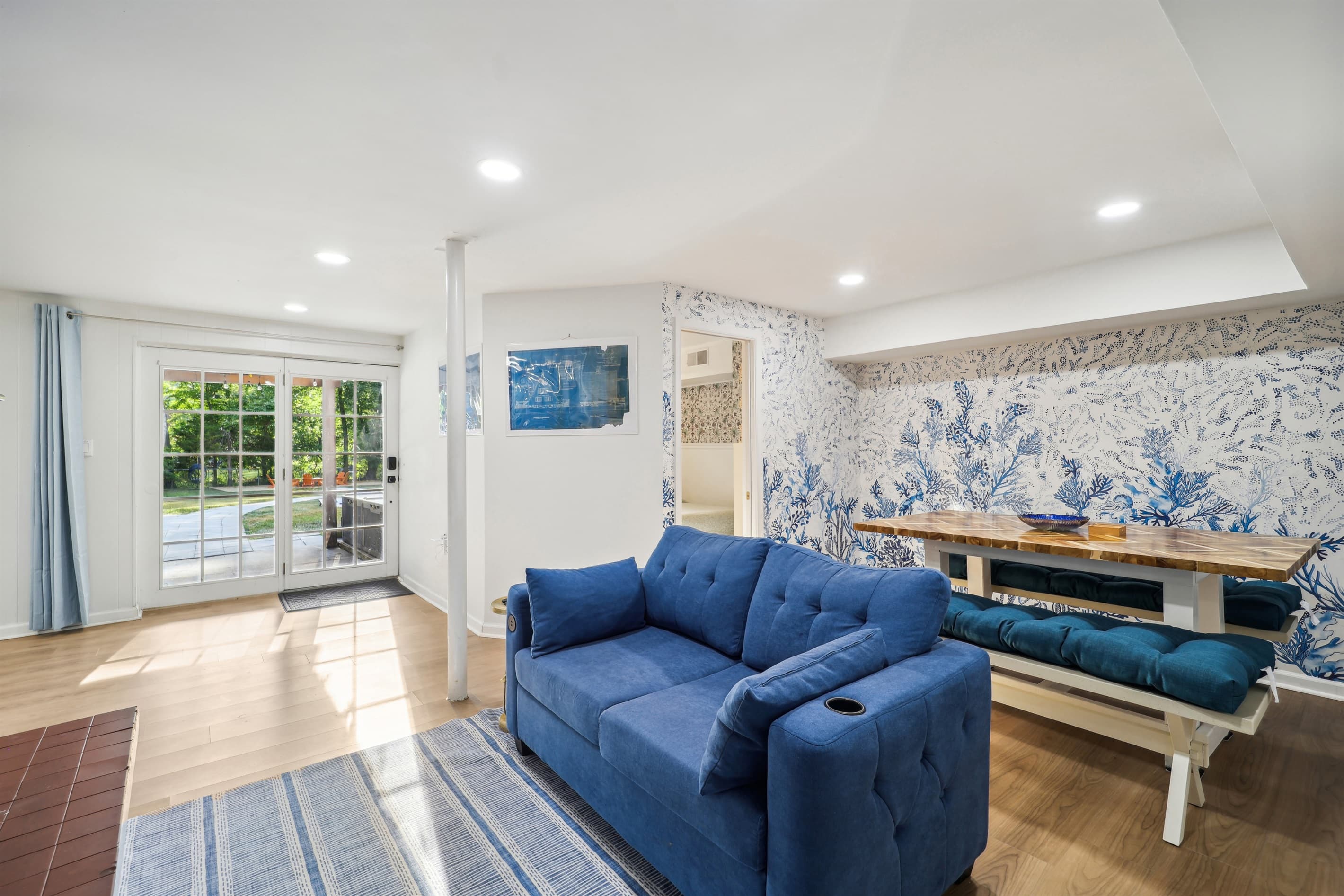 The sleeper sofa in the basement pulls out to be a full bed. There is also a second dining table area in the basement which can seat 6 people.