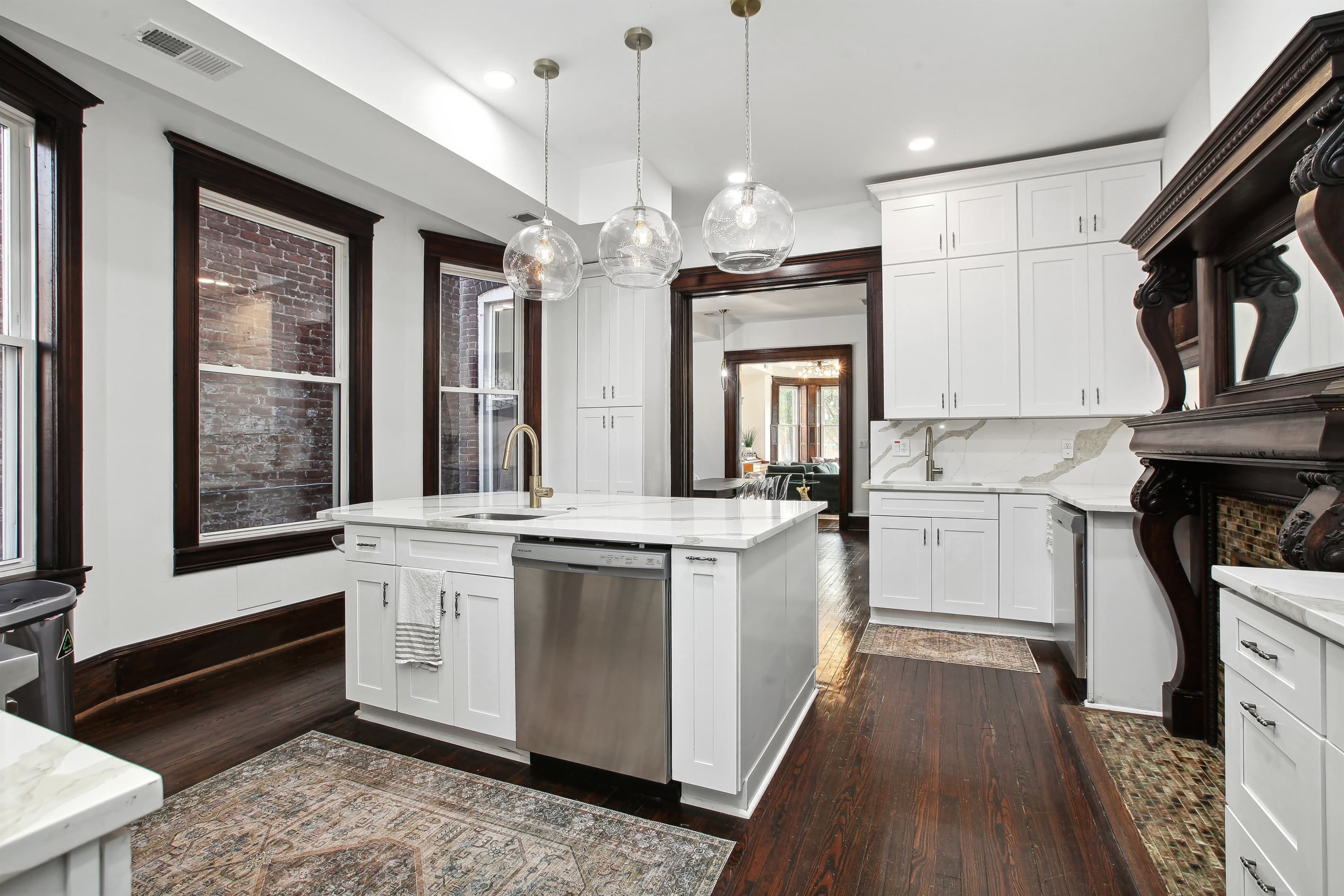 The kitchen is equipped with 2 sinks and 2 dishwashers, making meal prep and cleanup a breeze