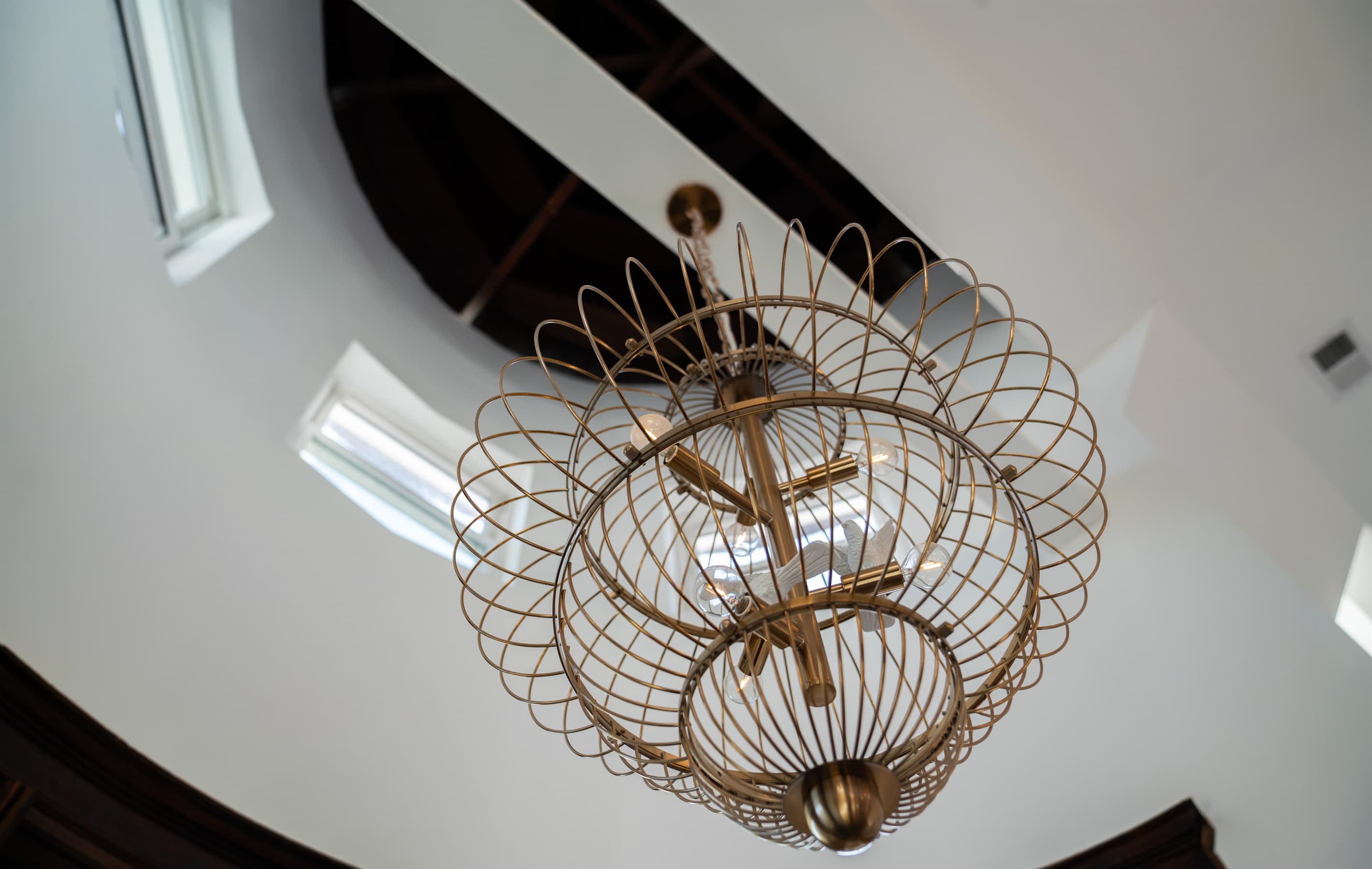 Continue admiring the carpentry from the 1800's by gazing up at the exposed turret and gold lighting fixtures