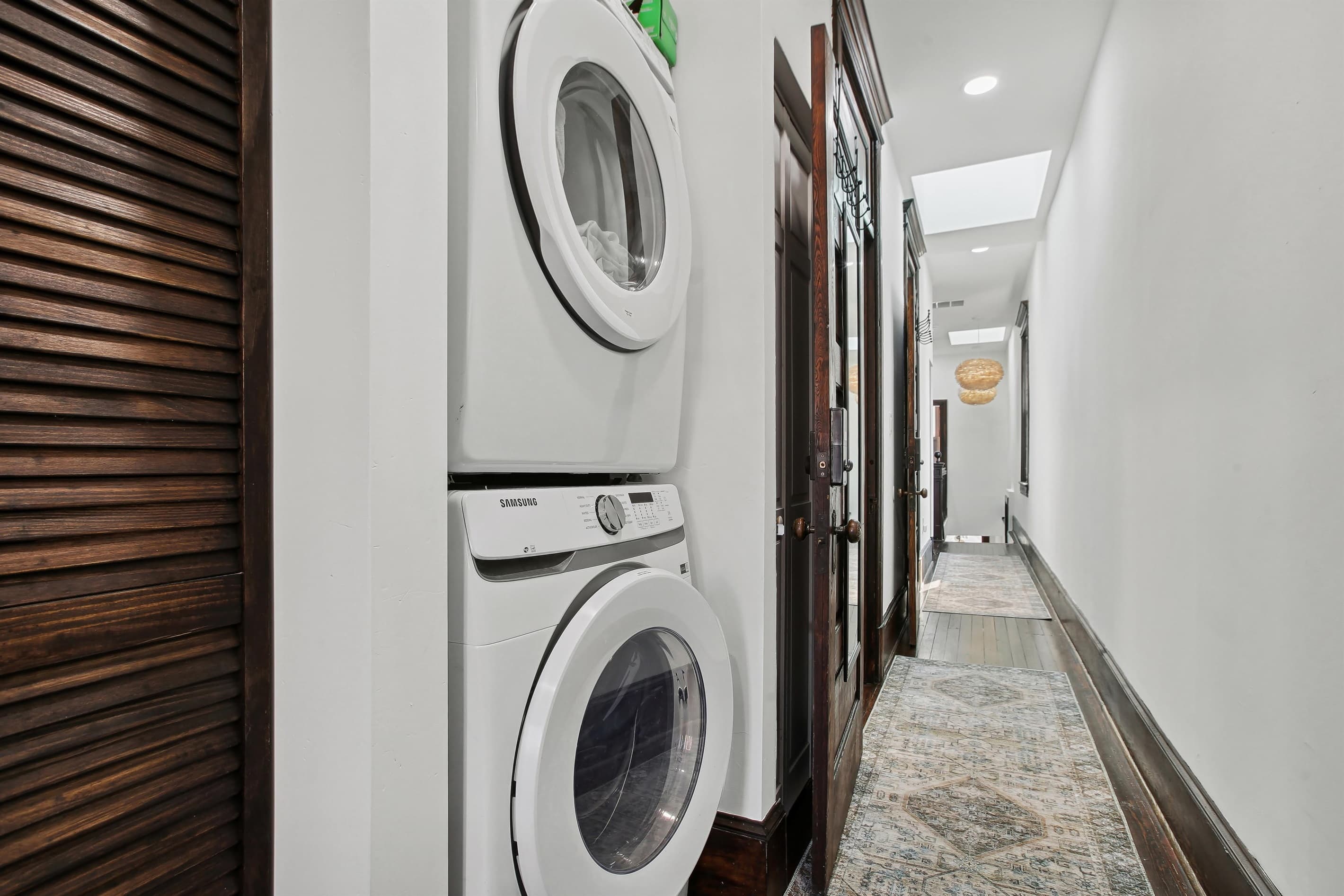 The full-size washer and dryer are upstairs between bedrooms #4 and #5