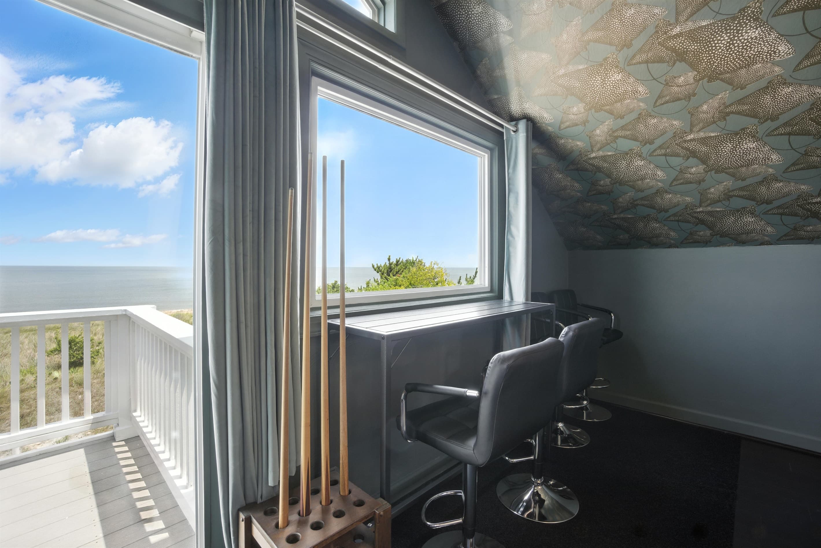 Enjoy the Game Room's views of the Ocean