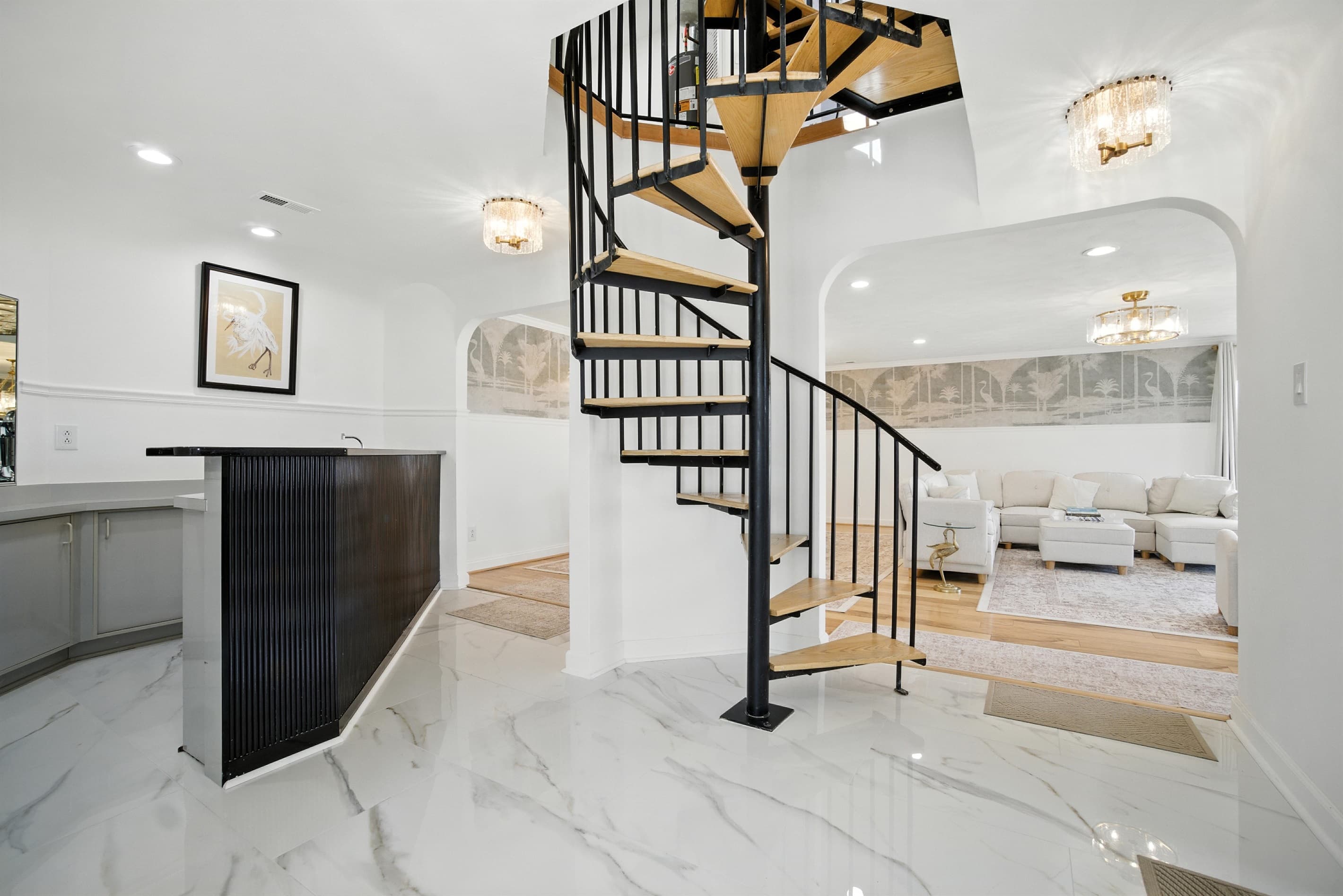 Spiral Stairs are at the center of Unit A, going all the way to the top level