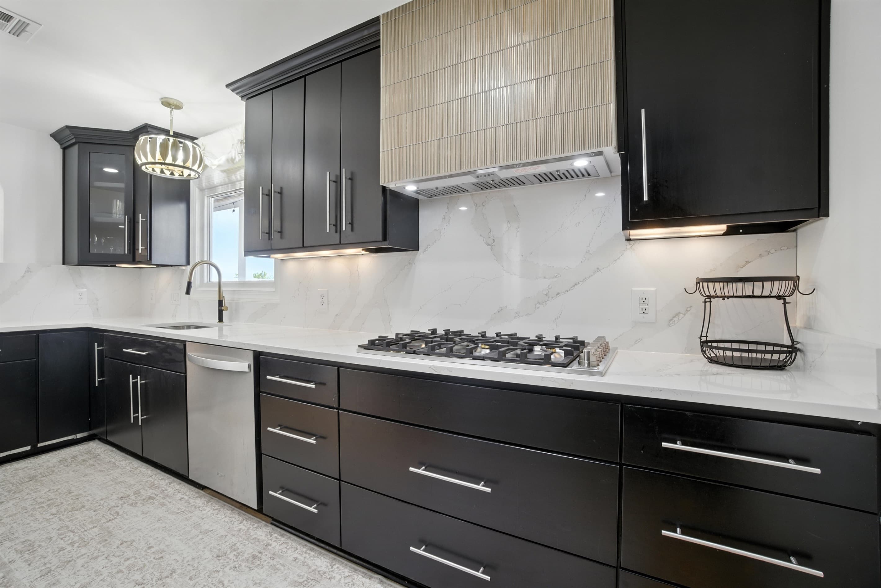 Kitchen supplies and utensils can be found in drawers and cabinets of Unit A