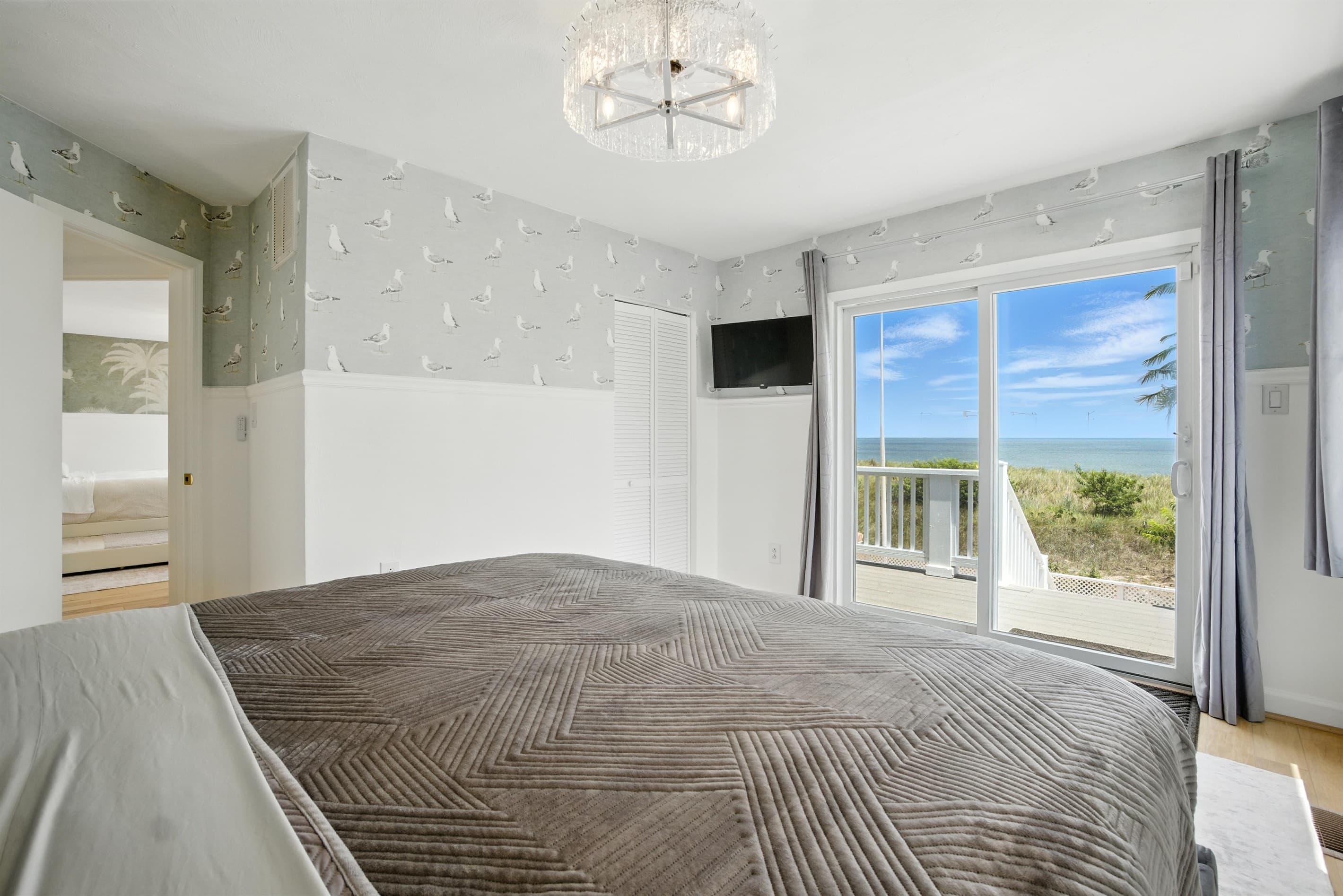 Bedroom # 2 in Unit A has views of the Ocean and is also directly accessible from the deck stairs
