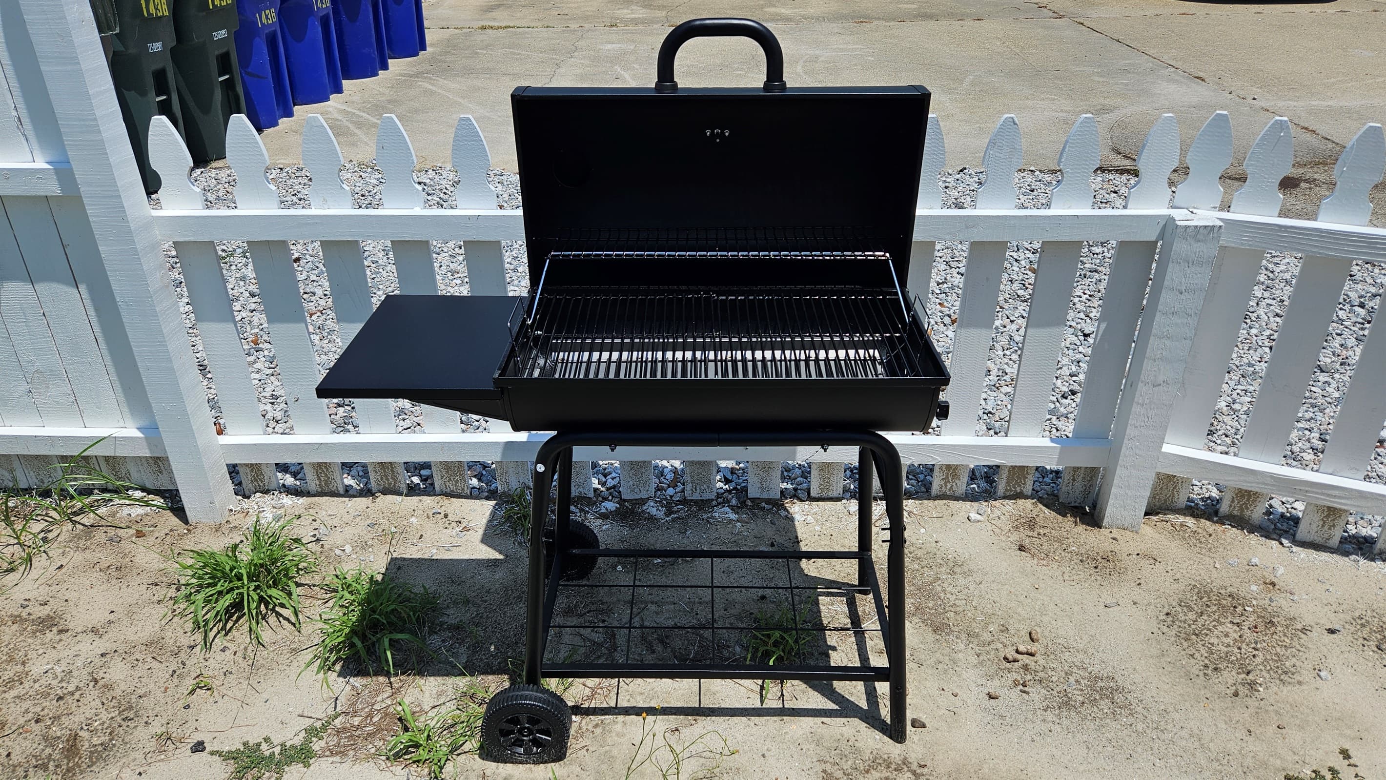Charcoal BBQ Grill in Front Yard (charcoal not provided)
