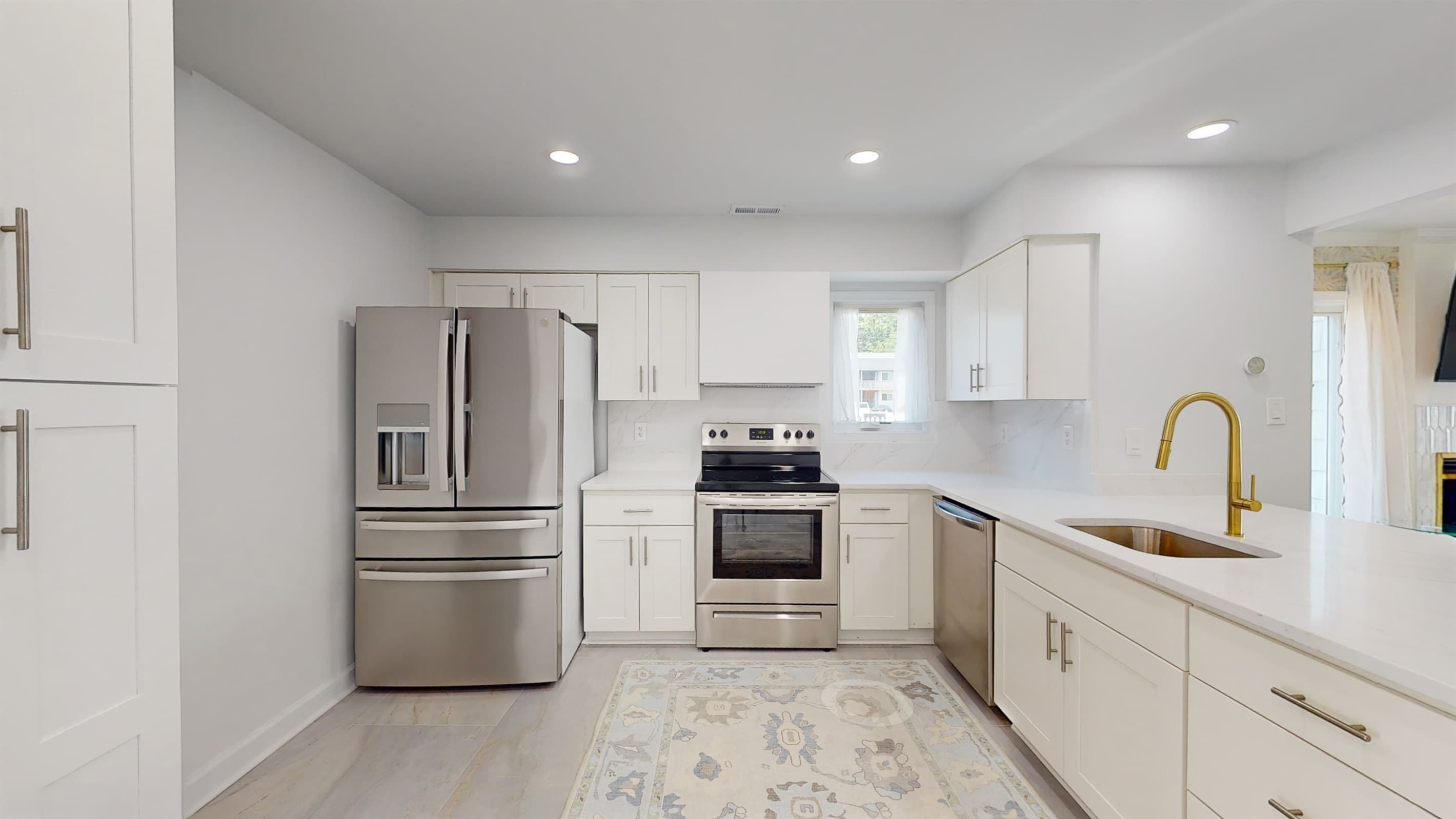 Unit B's Full Kitchen with Quartz Countertops