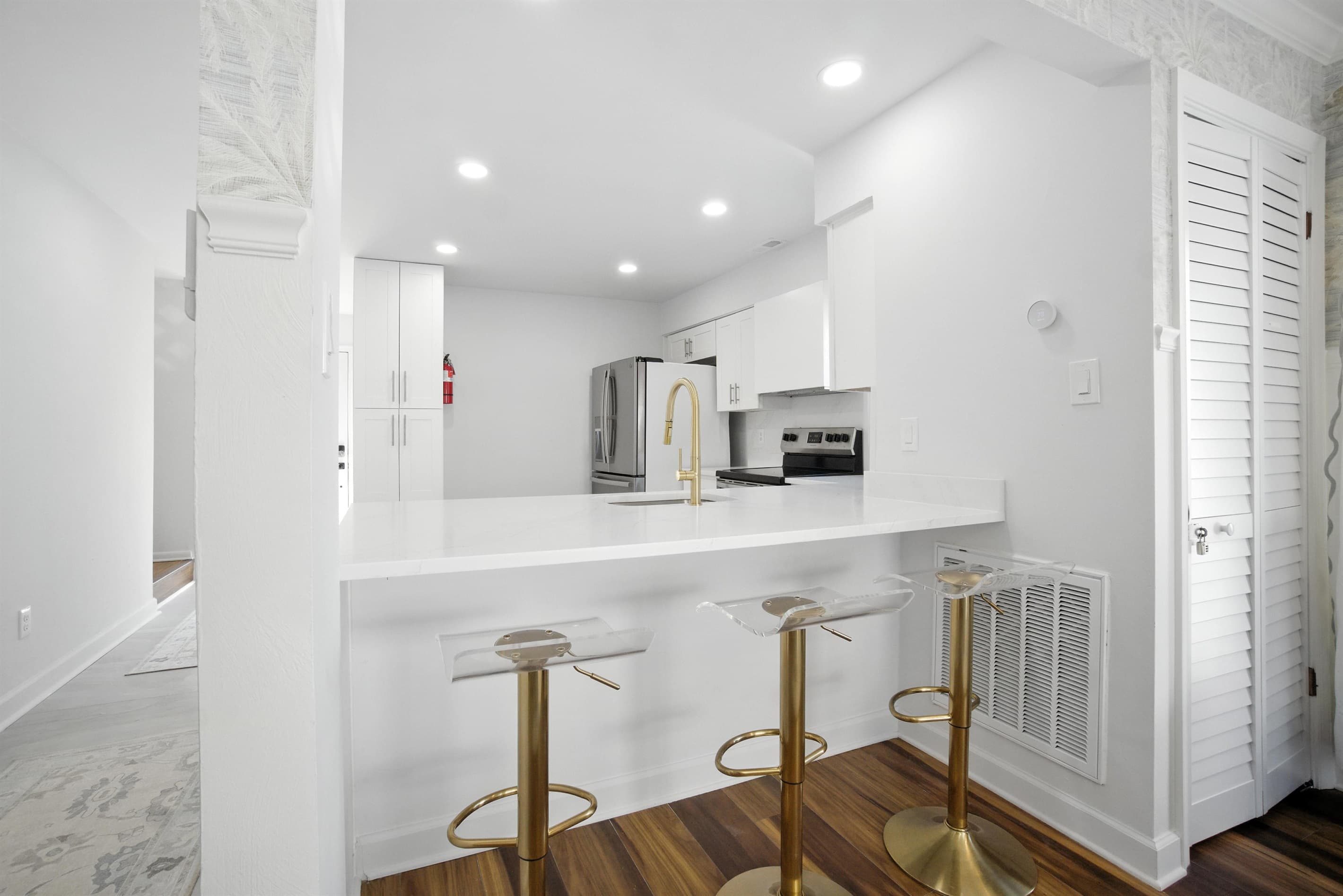 There are 3 bar stool seats at the Kitchen peninsula in Unit B