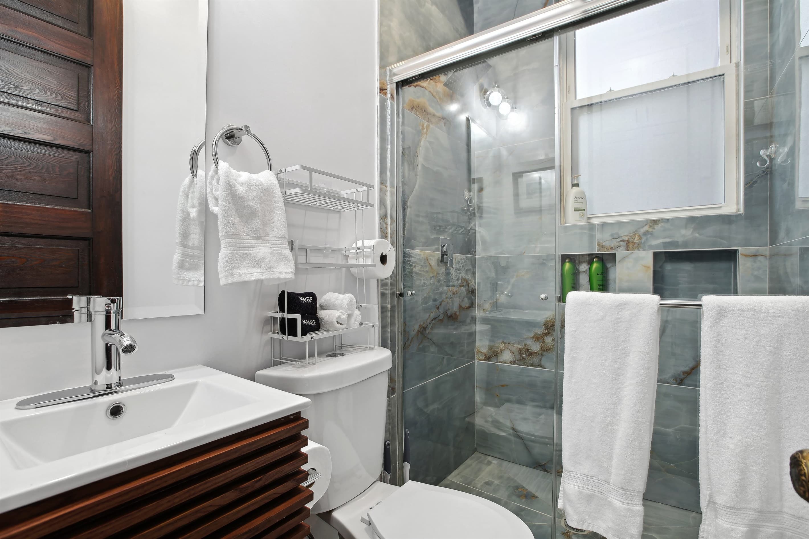 The full bathroom on the main level has a walk-in shower