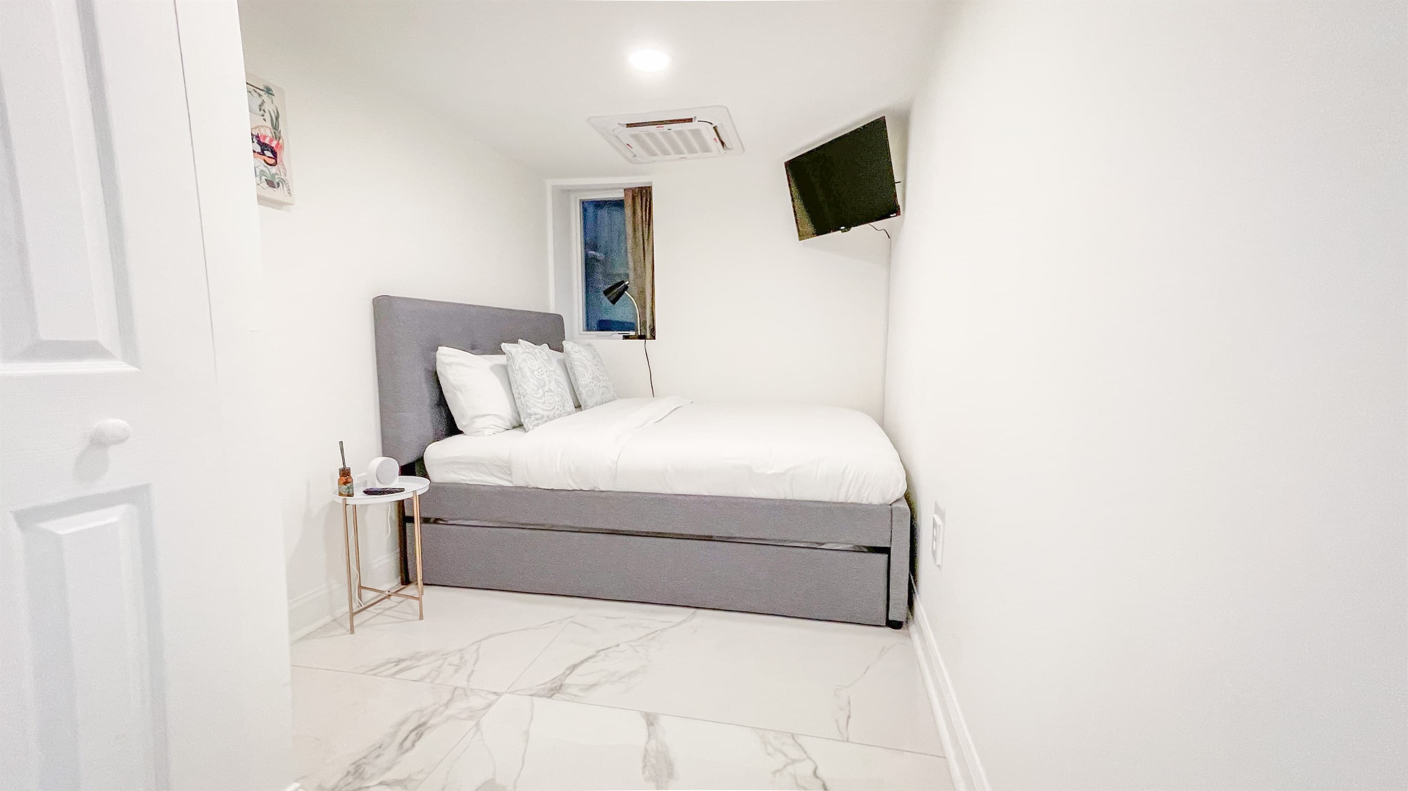 Bedroom #3 has a full bed and a twin trundle bed below