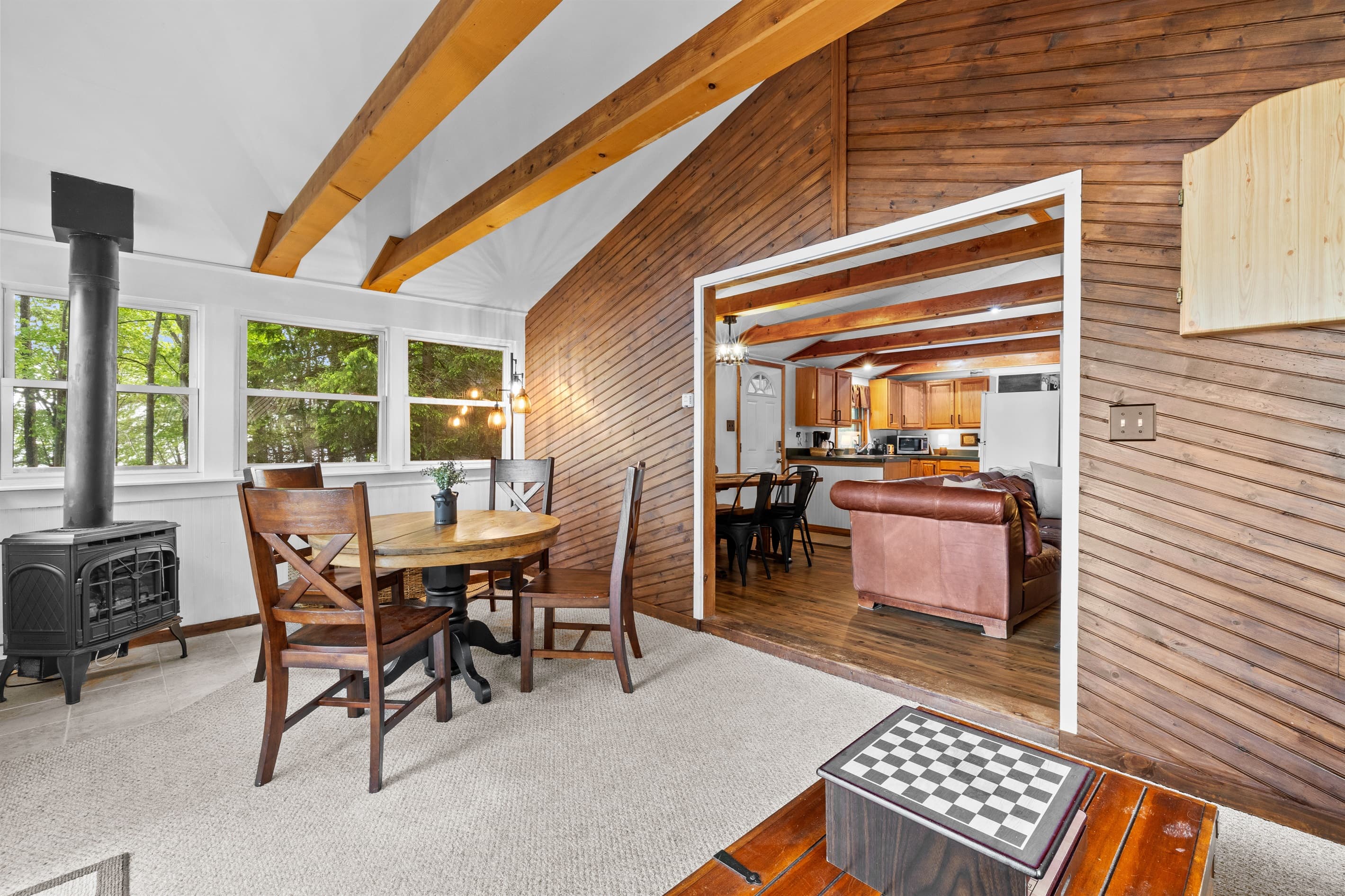 Sunroom with a lake view