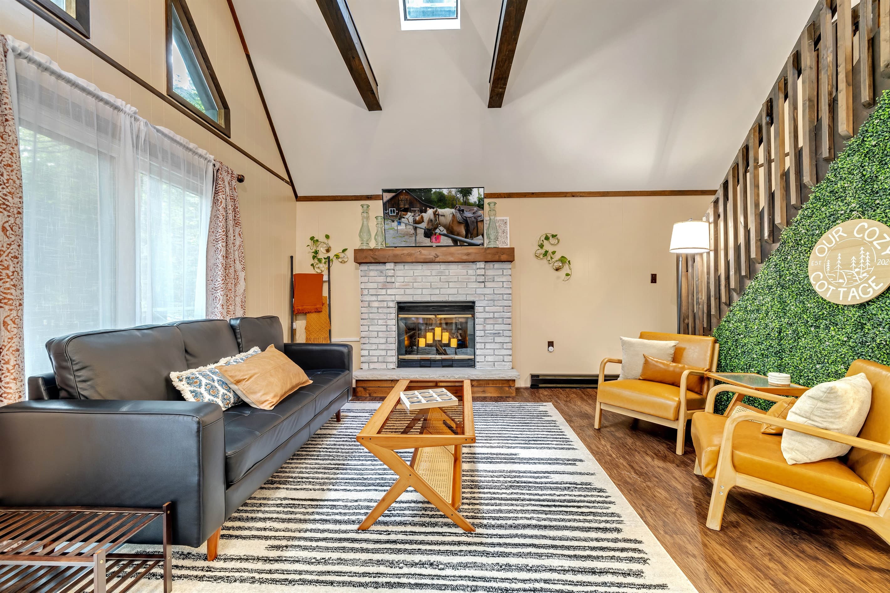 Living room with seating and TV