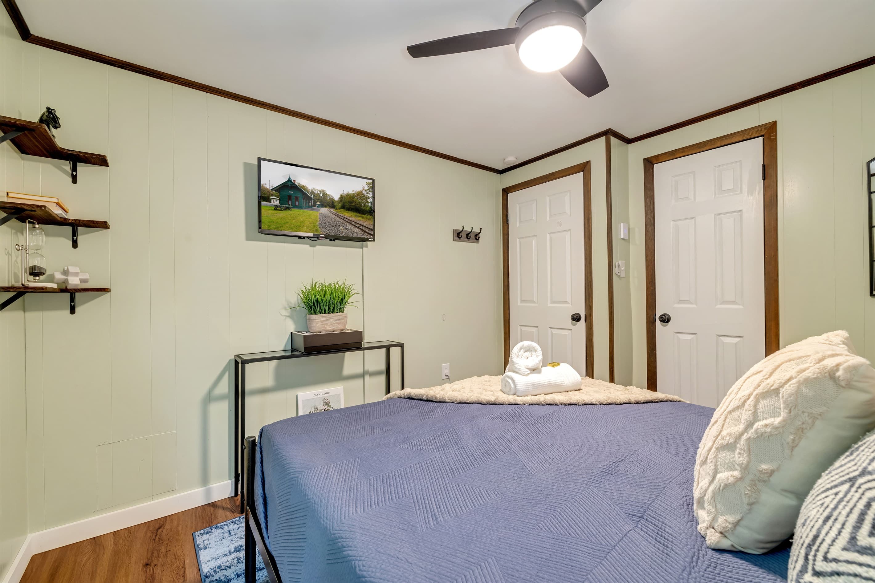 Bedroom 1 with queen size bed and smart TV