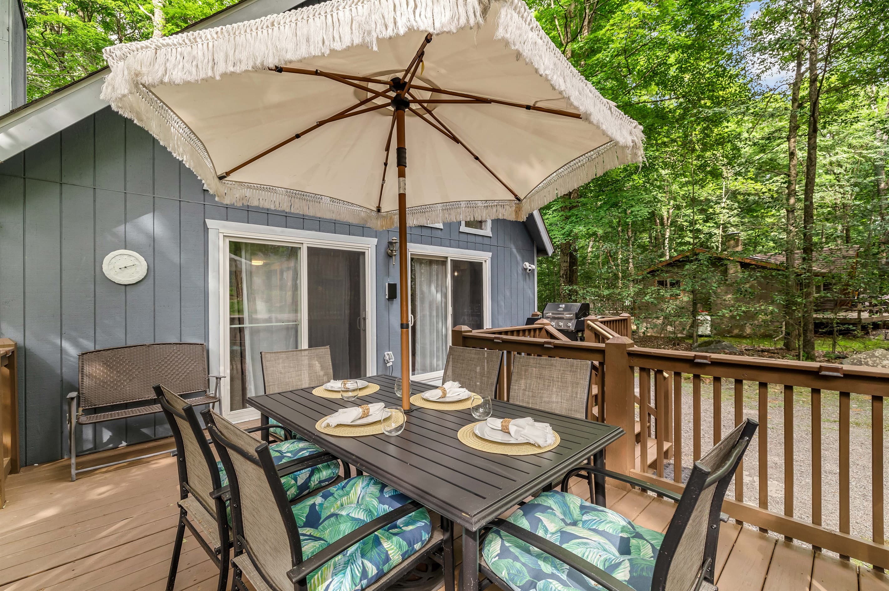 Deck with table, umbrella and seating