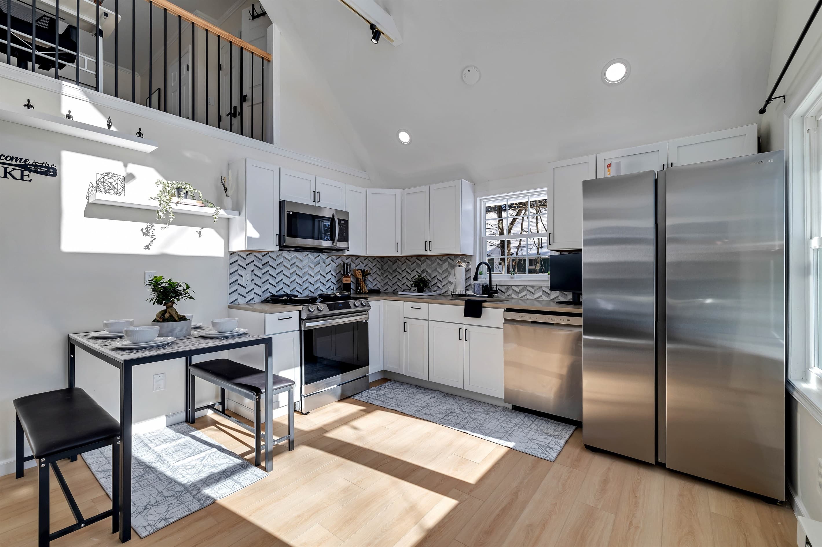 Fully stocked kitchen with stainless appliances