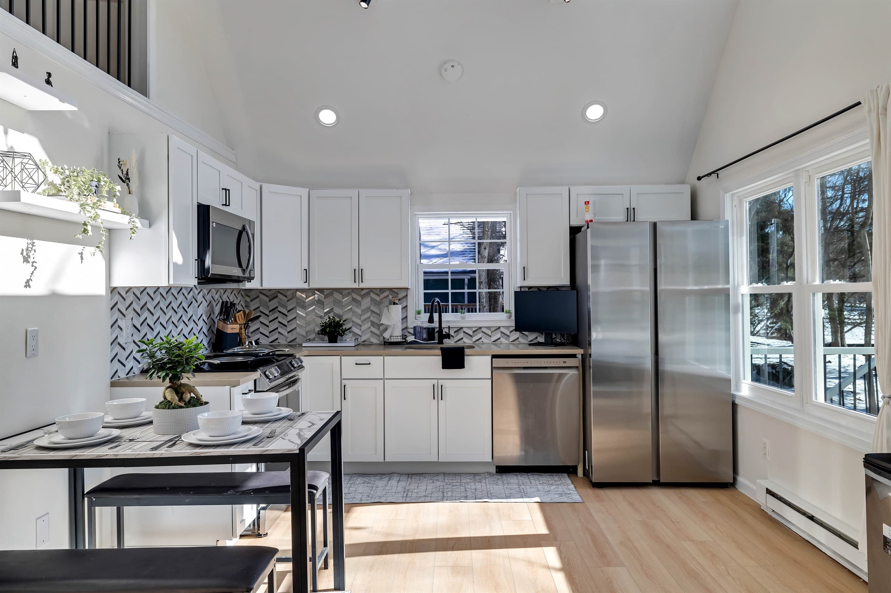 Fully stocked kitchen with stainless appliances
