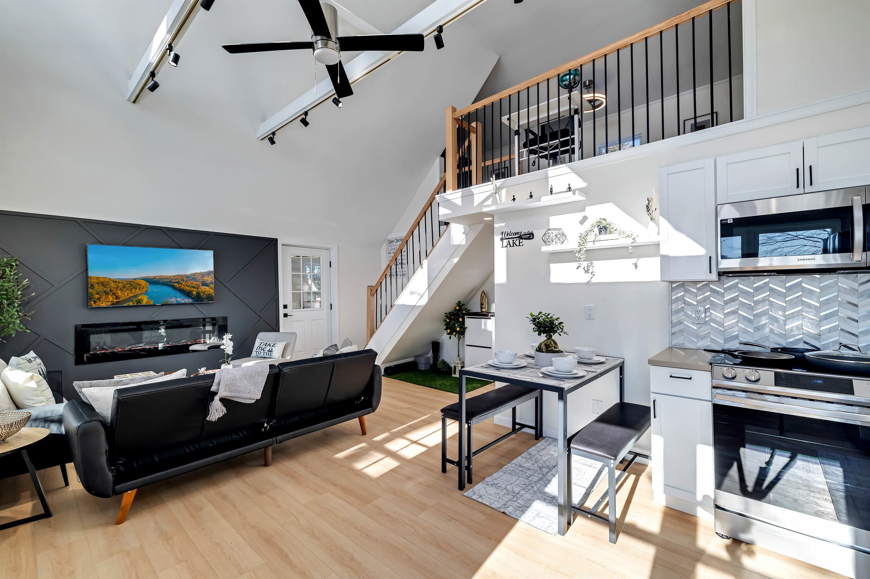 Living room with seating and Smart TV
