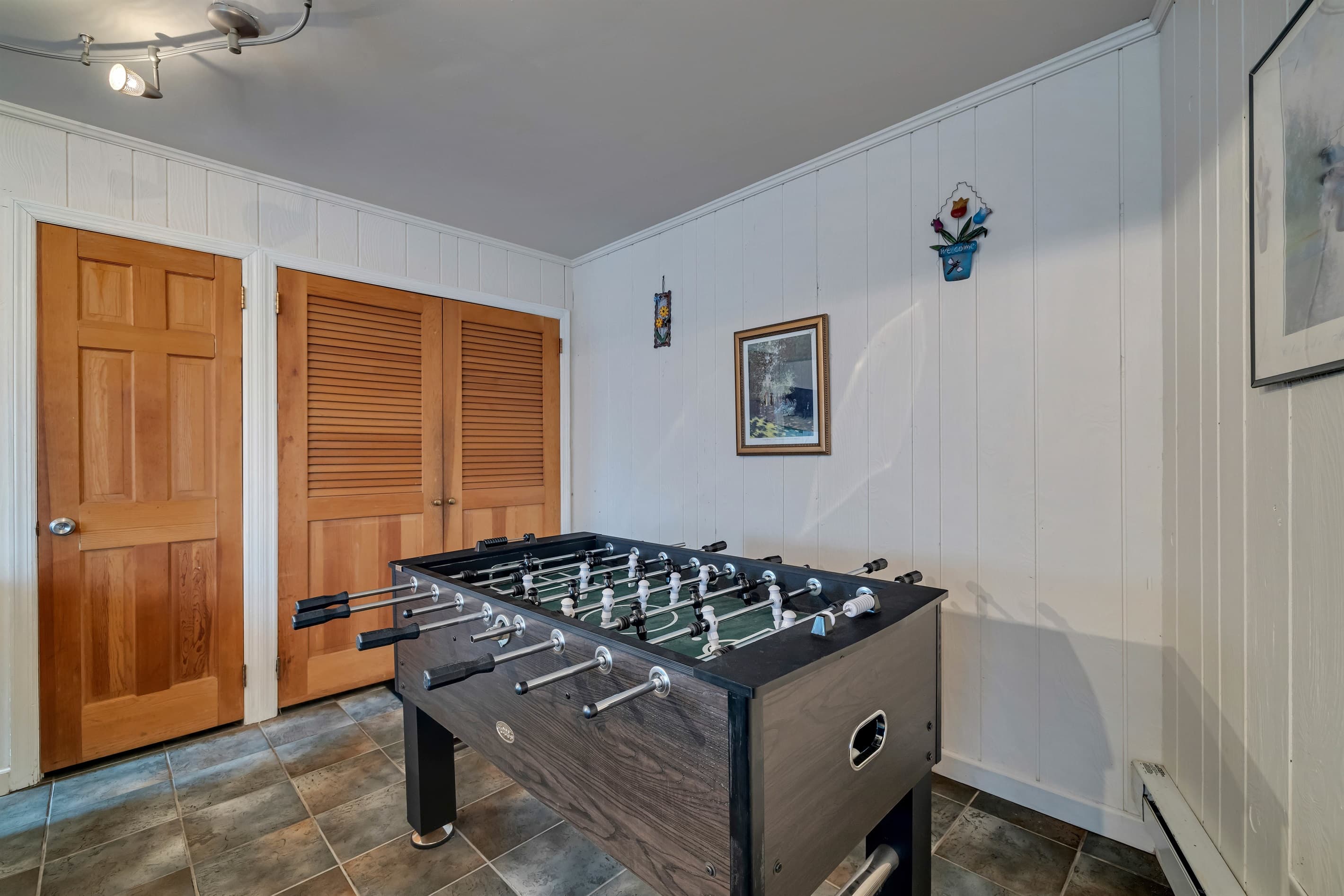 Foosball table, lower level, family room