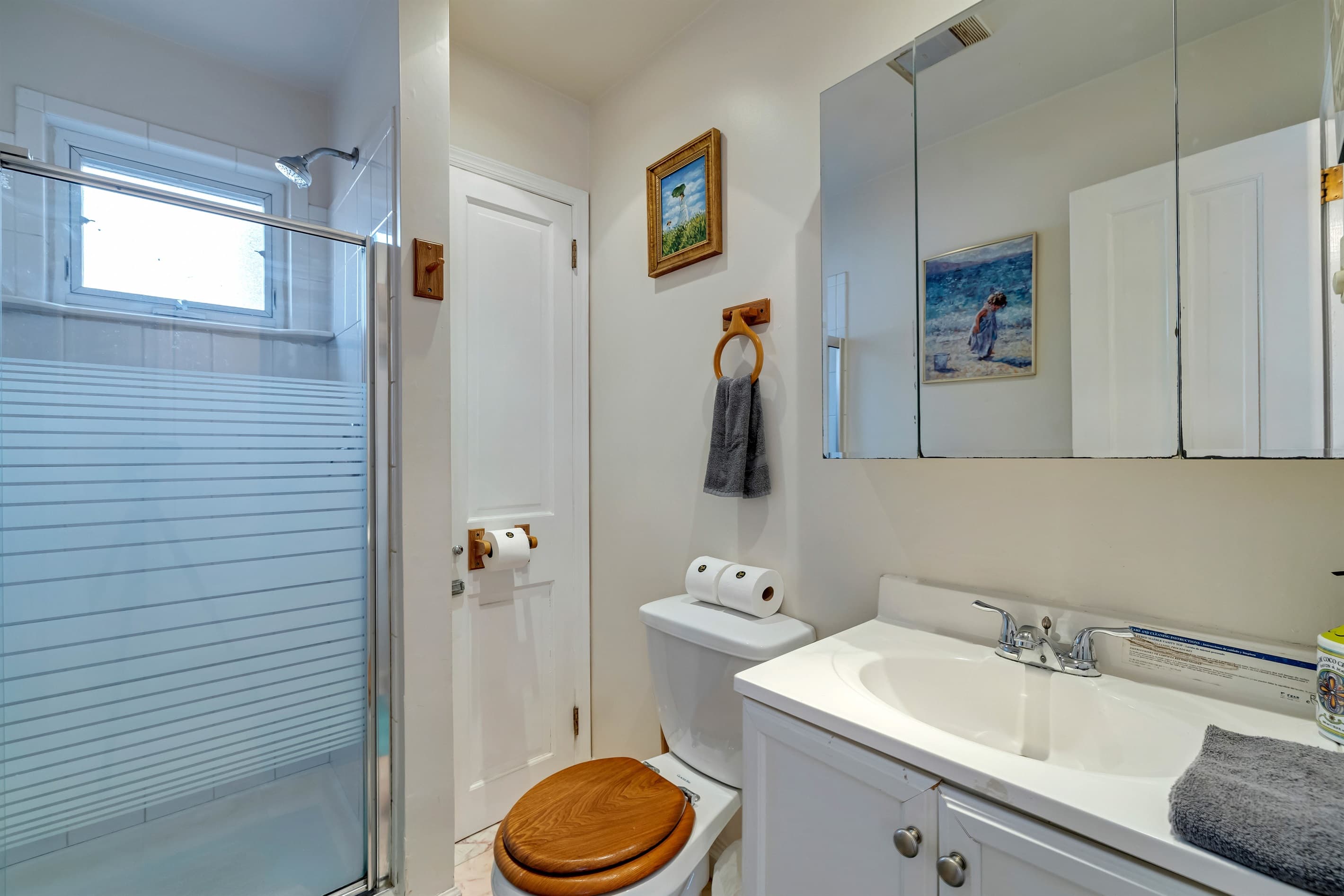Bathroom with walk-in shower, located on the lower level